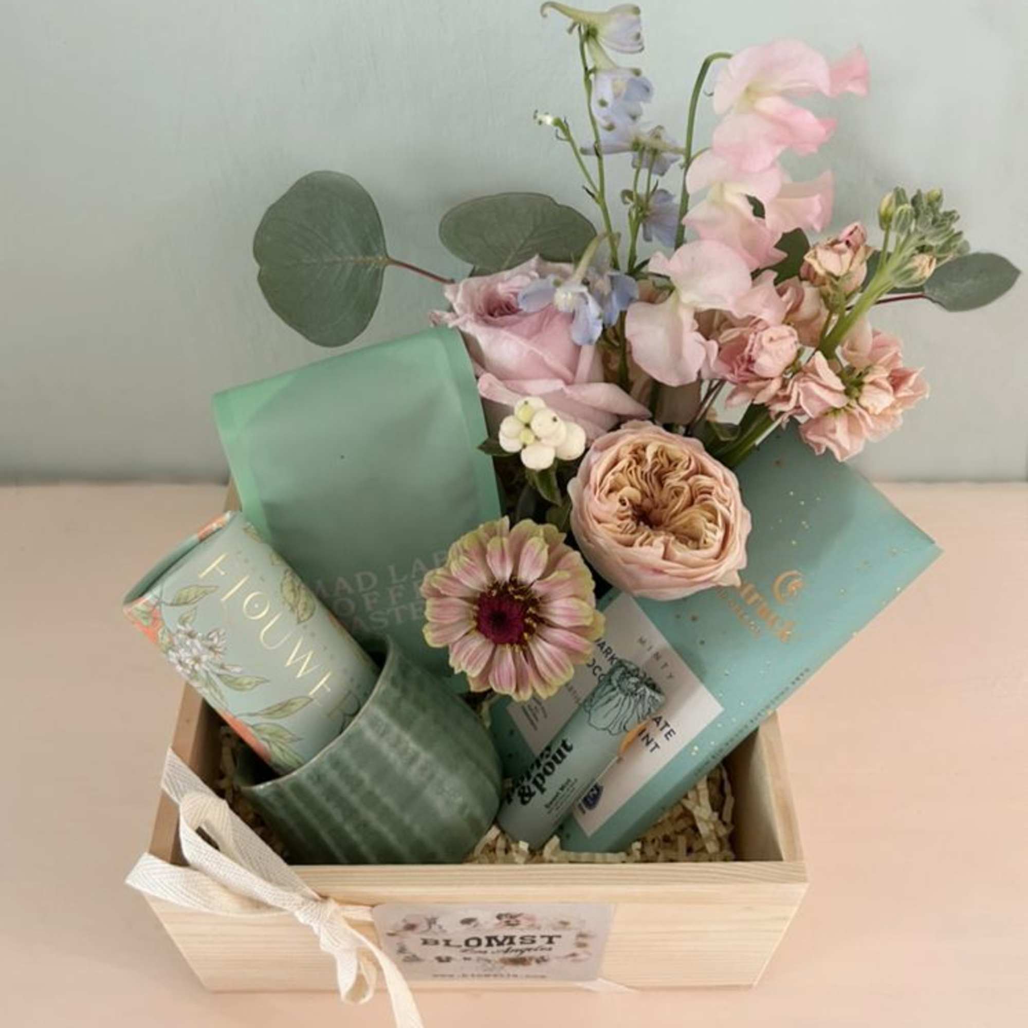 Beautiful gift box with luxe goods in the beautiful color of light