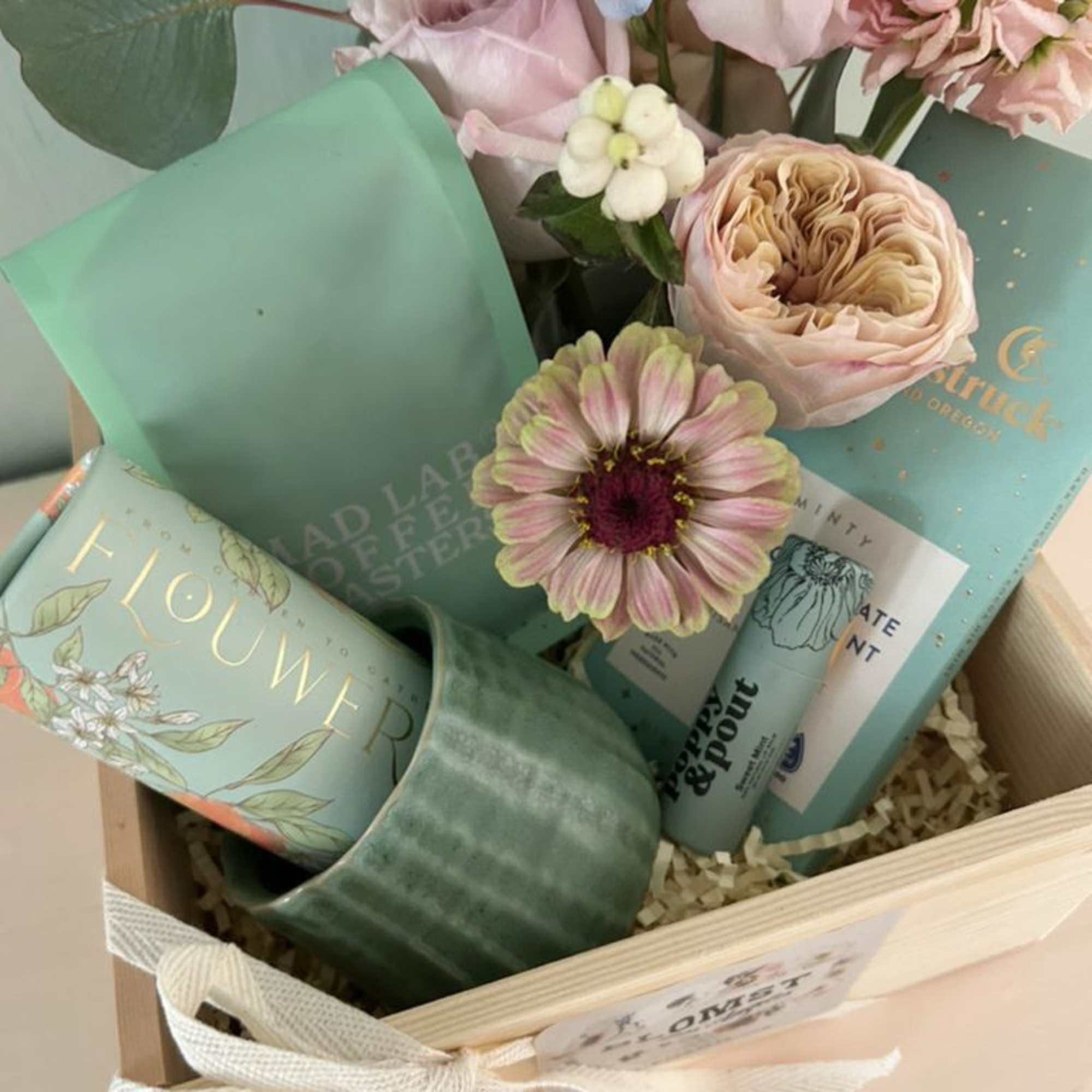 Beautiful gift box with luxe goods in the beautiful color of light