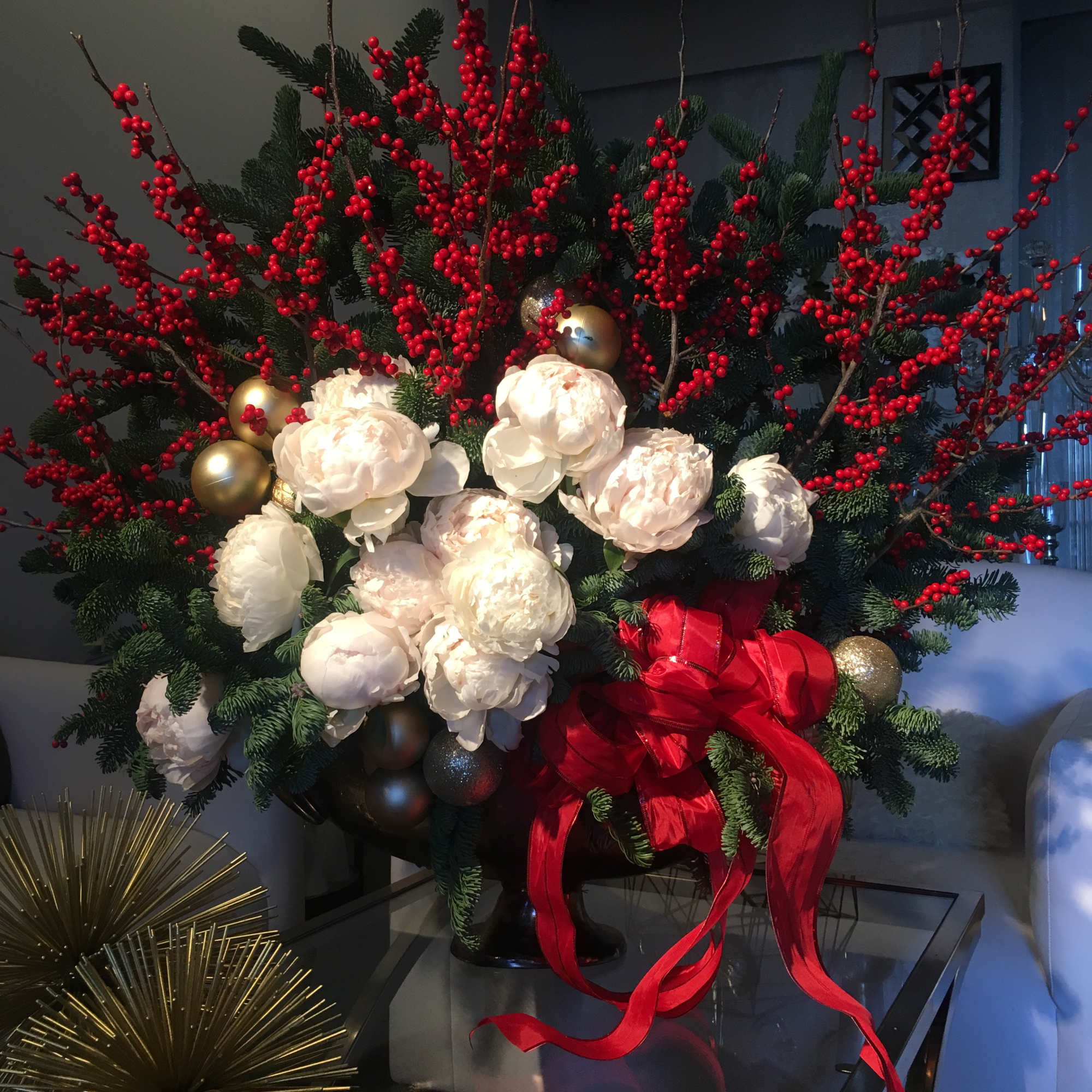 This luxurious and lavish arrangement is a perfect addition to any holiday!