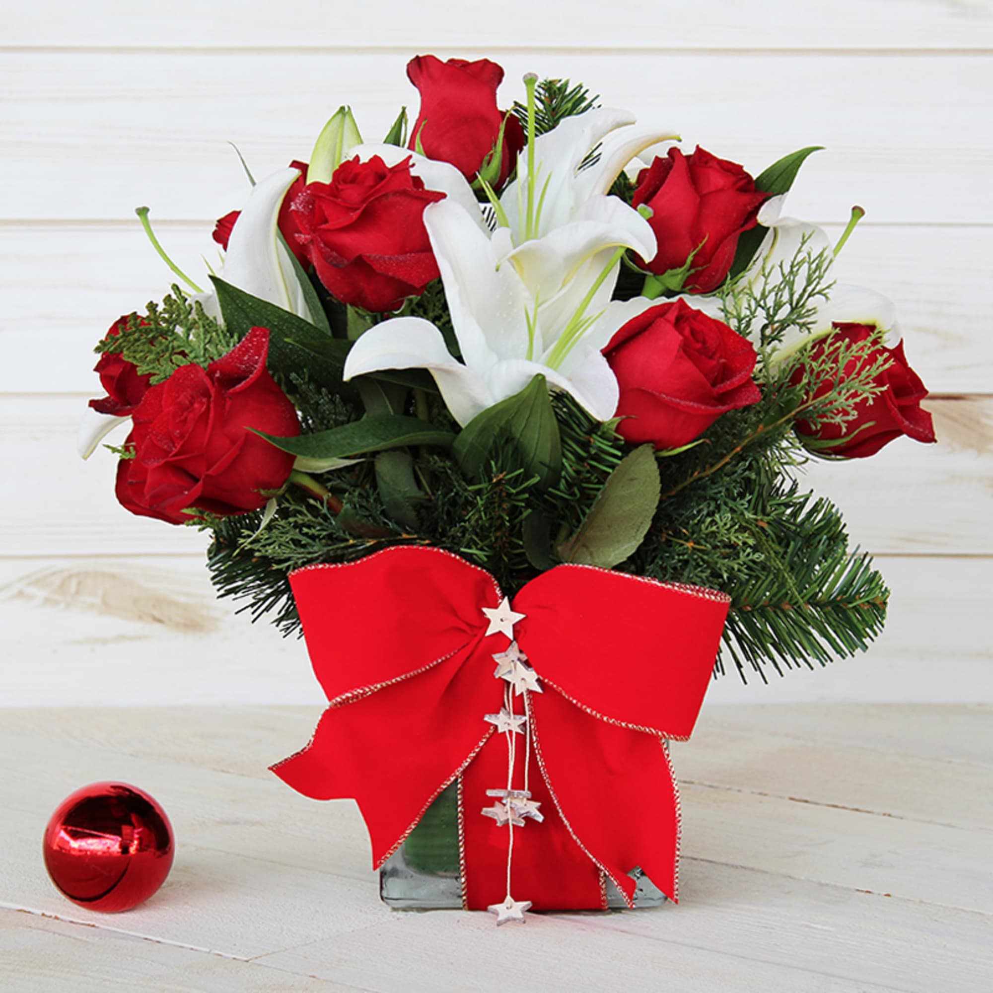 A Christmas re-interpretation of our popular Pastel Rose &amp; Lily Cube Bouquet;