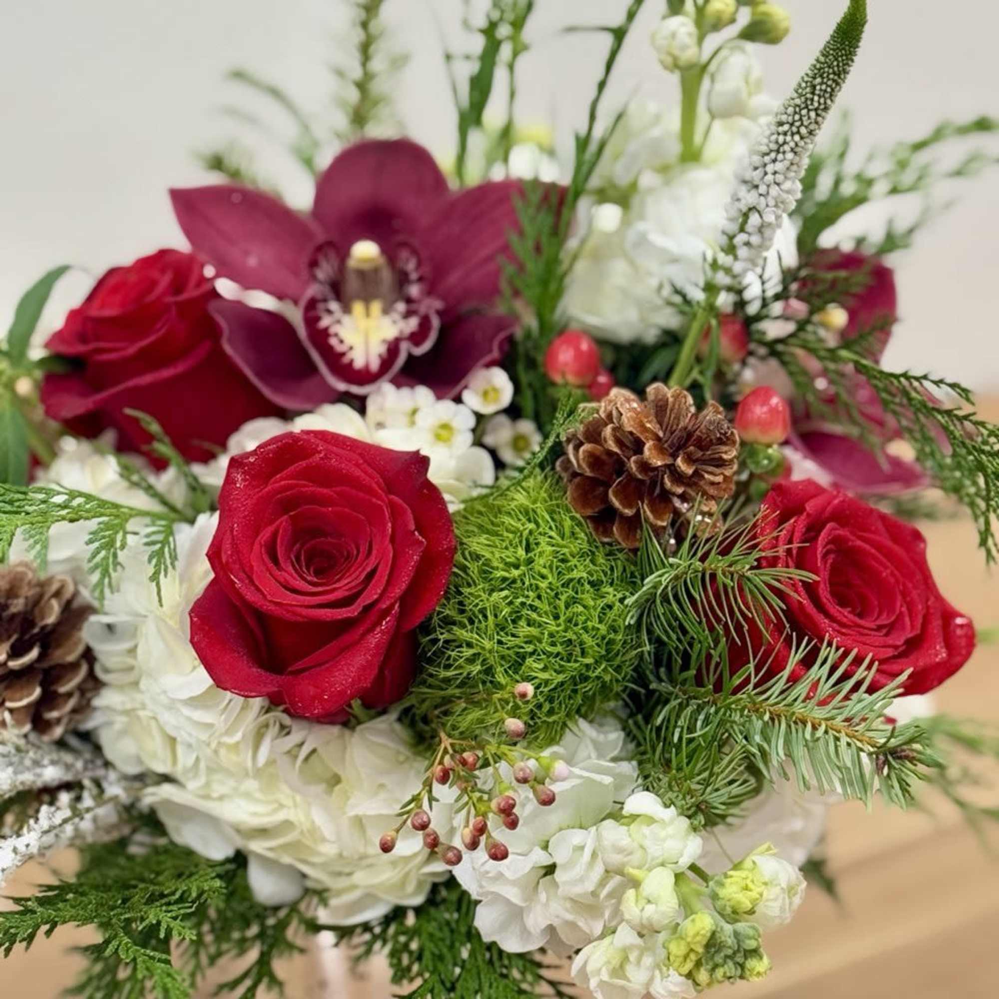 &quot;A stunning festive flower arrangement made in a mercury vase, the perfect