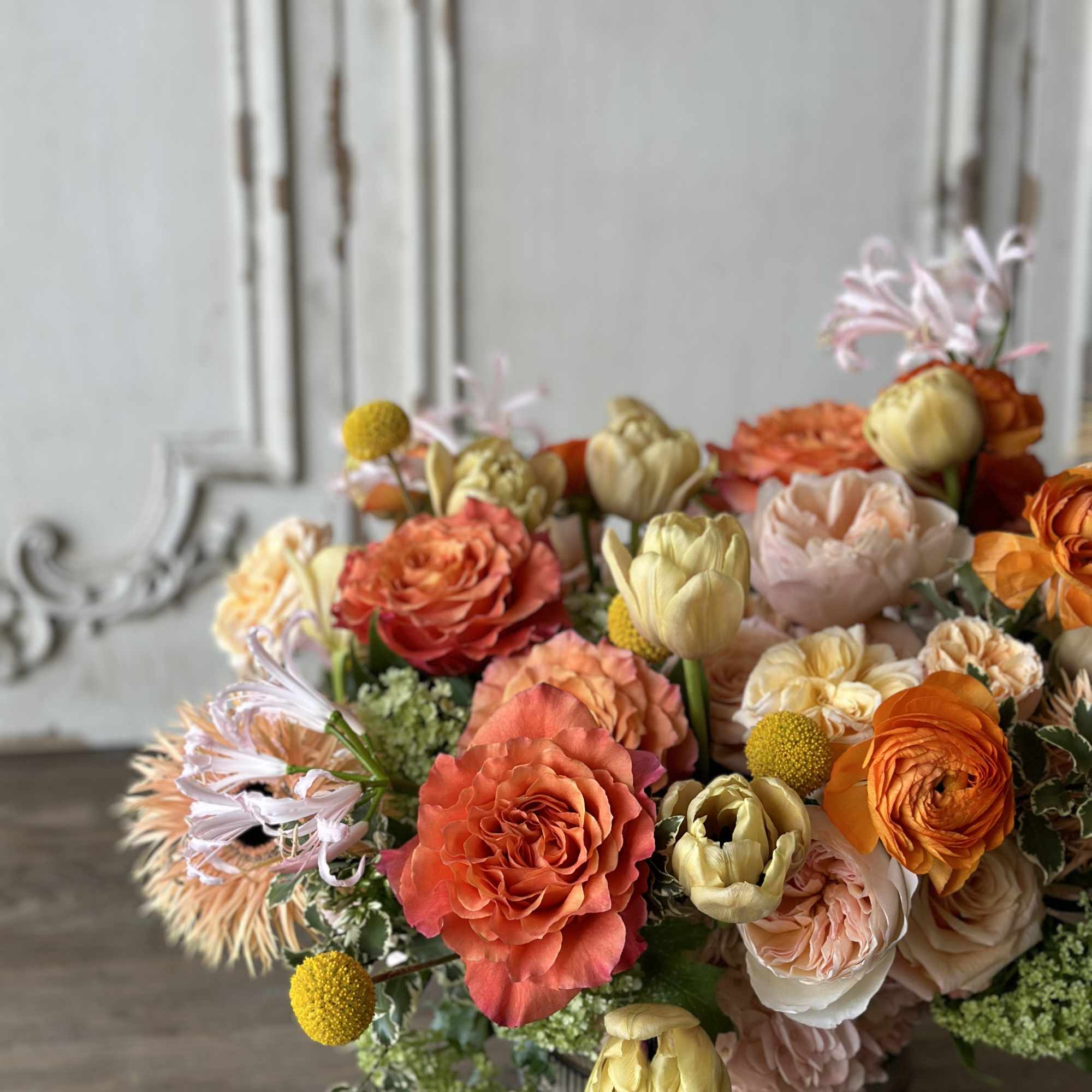 The AUBREY is composed of Peach Garden Roses and Crisp Tulips. Fragrant