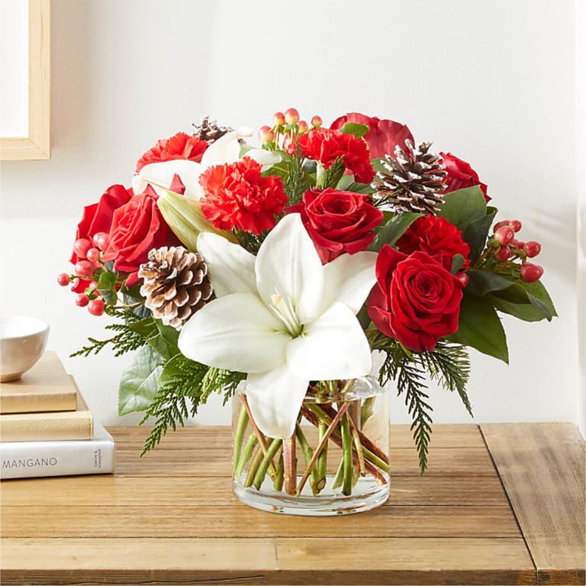 Infuse your holiday season with radiant cheer and vibrant blooms, designed to