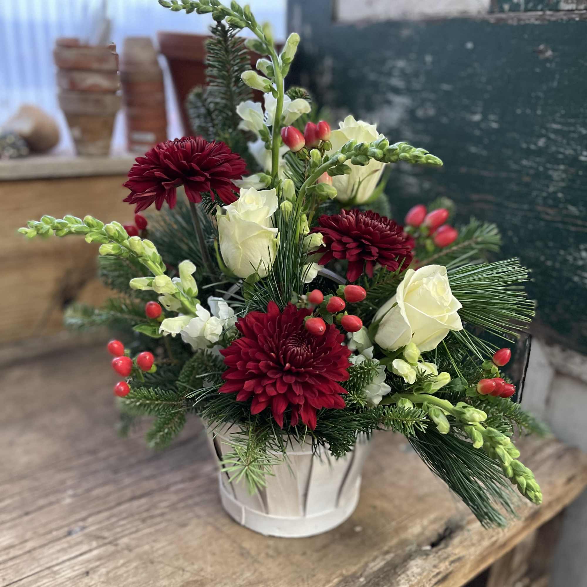 The perfect holiday basket arrangement to send to those you love. 