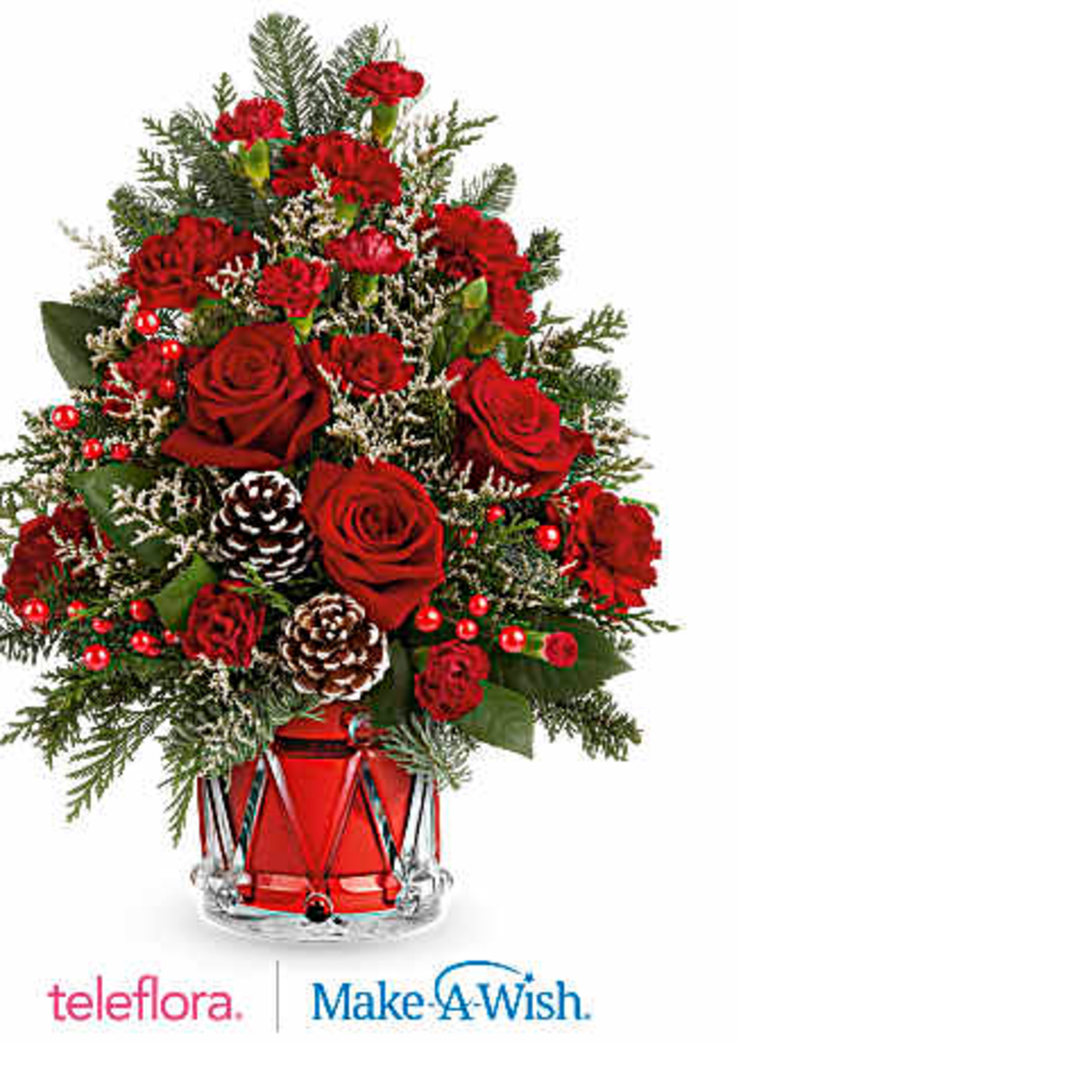 Teleflora&#039;s Yuletide Sparkle Tree is a festive floral Christmas tree made of