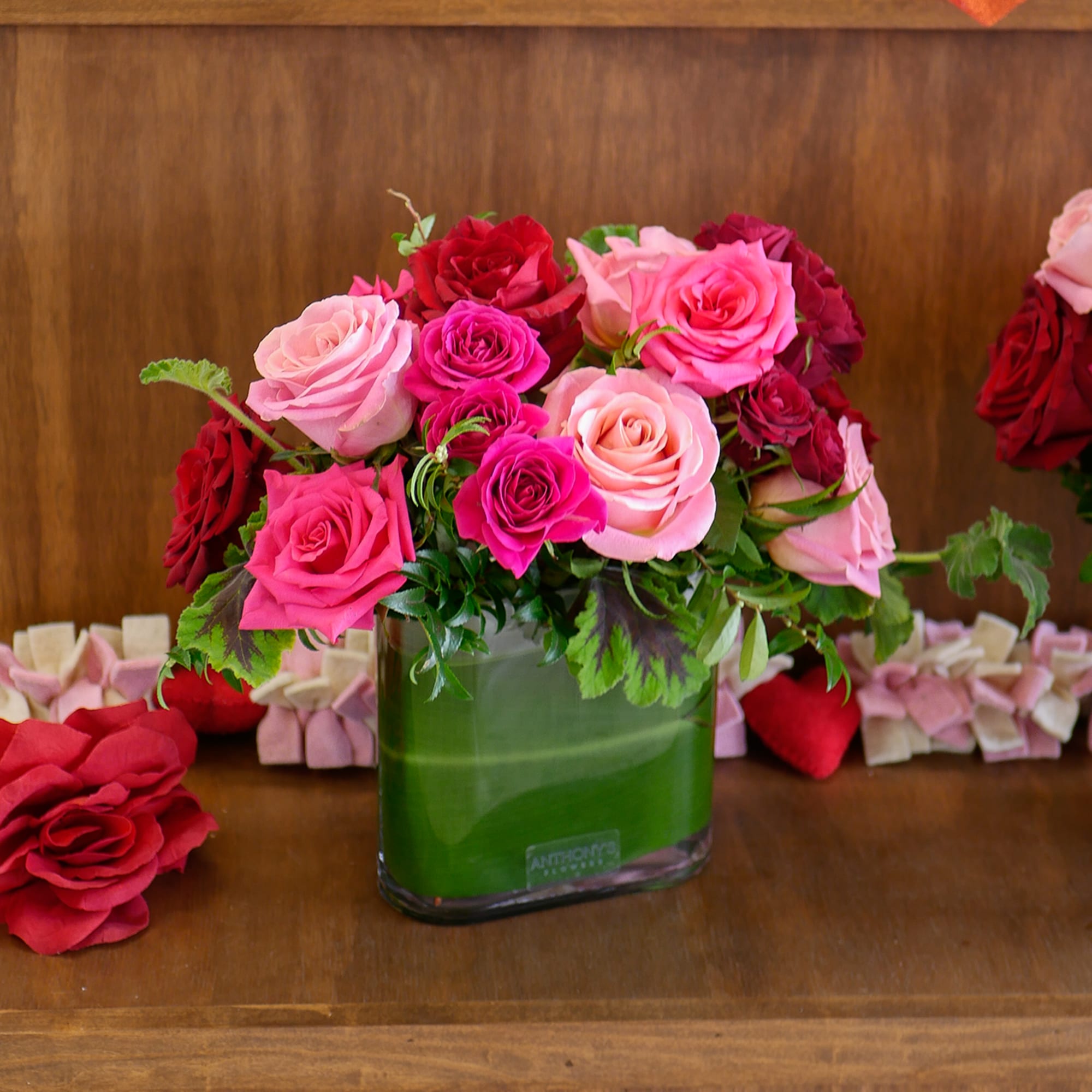 This romantic arrangement features a beautiful collection of our premium red and
