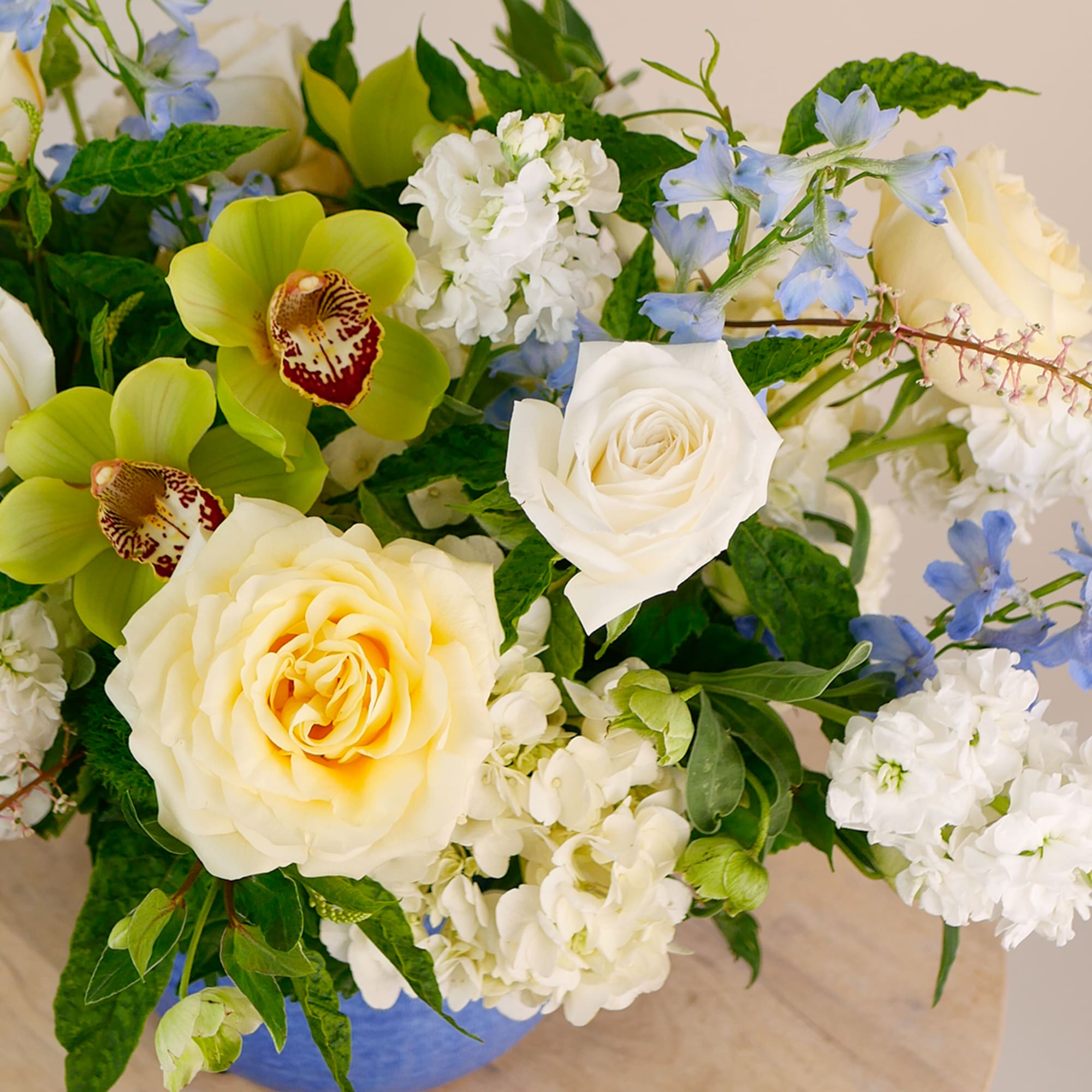 A fresh and cheerful arrangement inspired by the colors of the Mediterranean.