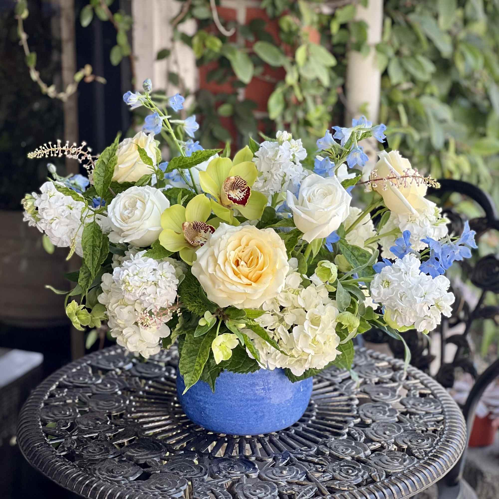 A fresh and cheerful arrangement inspired by the colors of the Mediterranean.