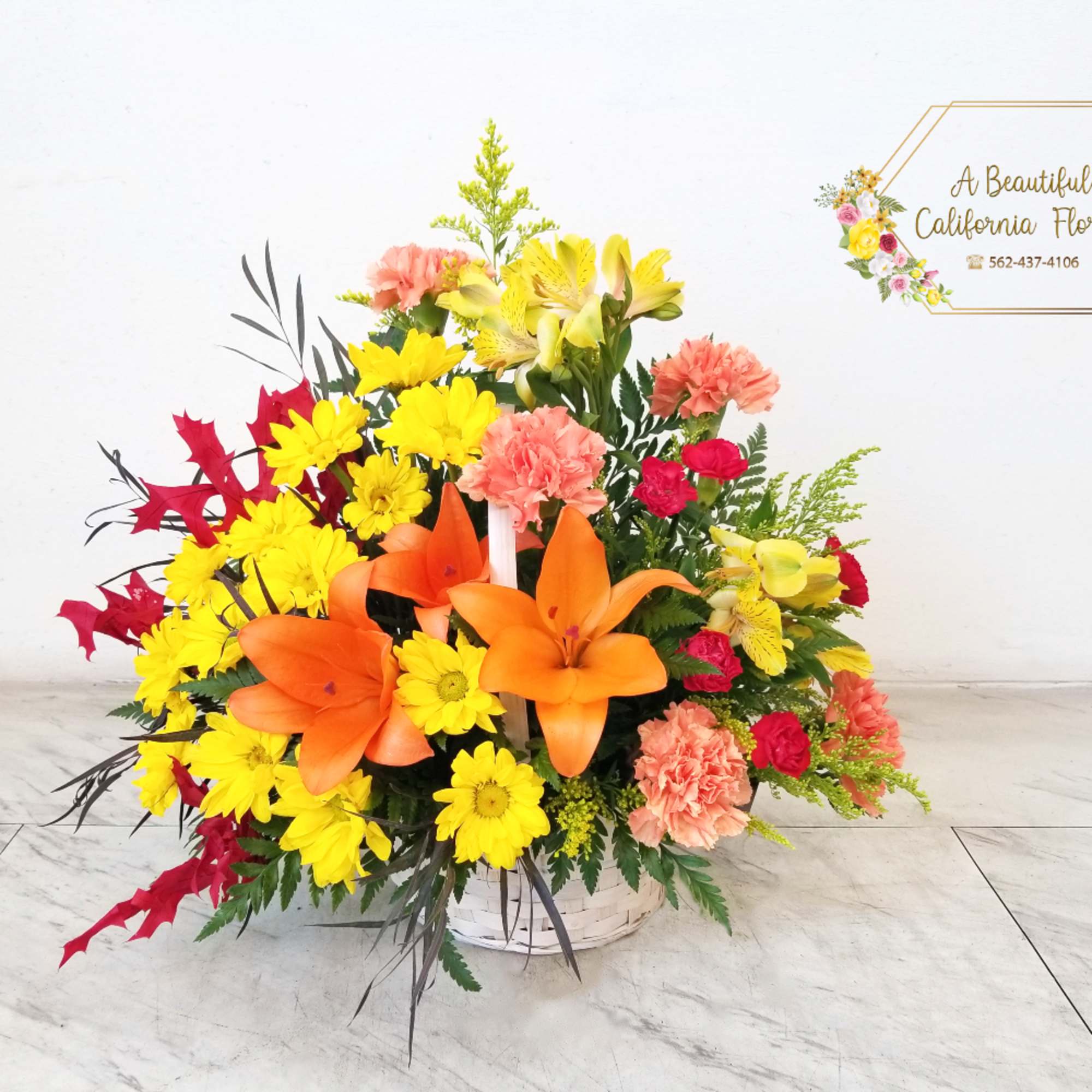 Autumn&#039;s Wonder, a beautiful arrangement of Fall blooms, foliage and textures. Presented