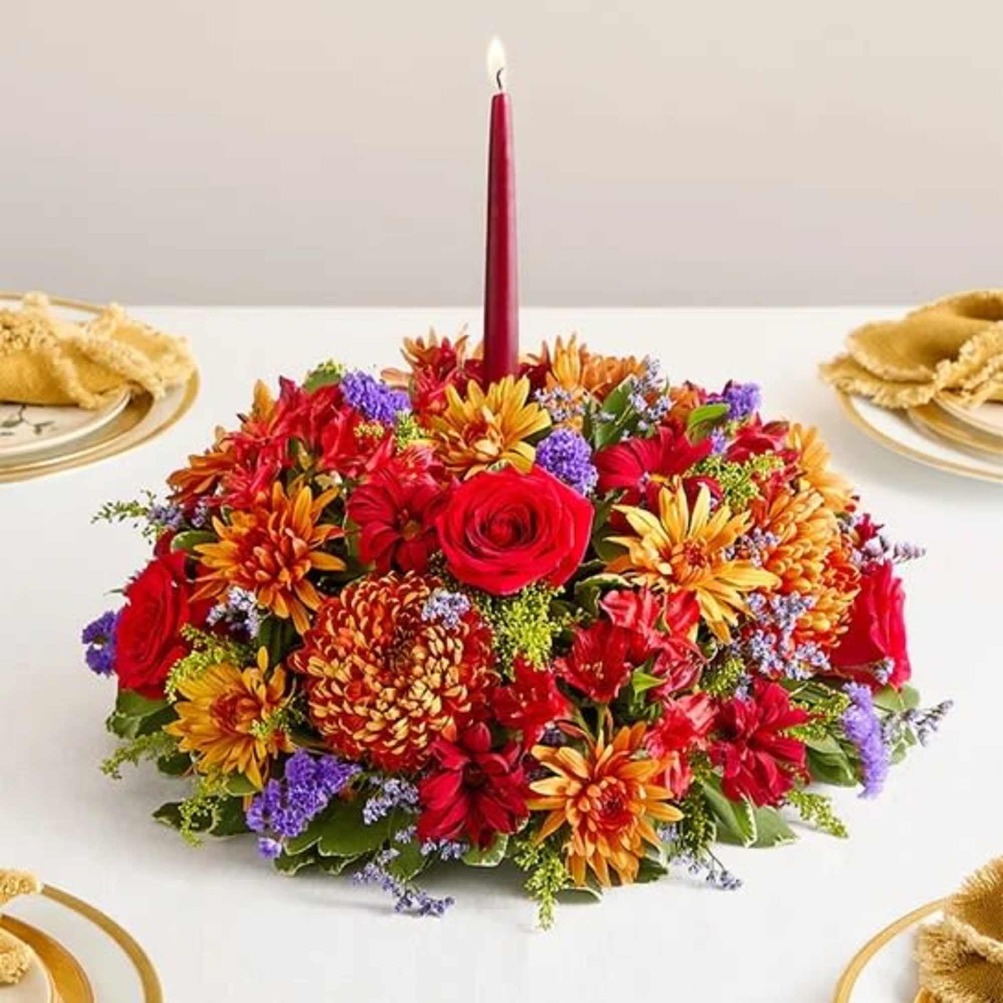 Our centerpiece captures the rich beauty of autumn, with bursts of red