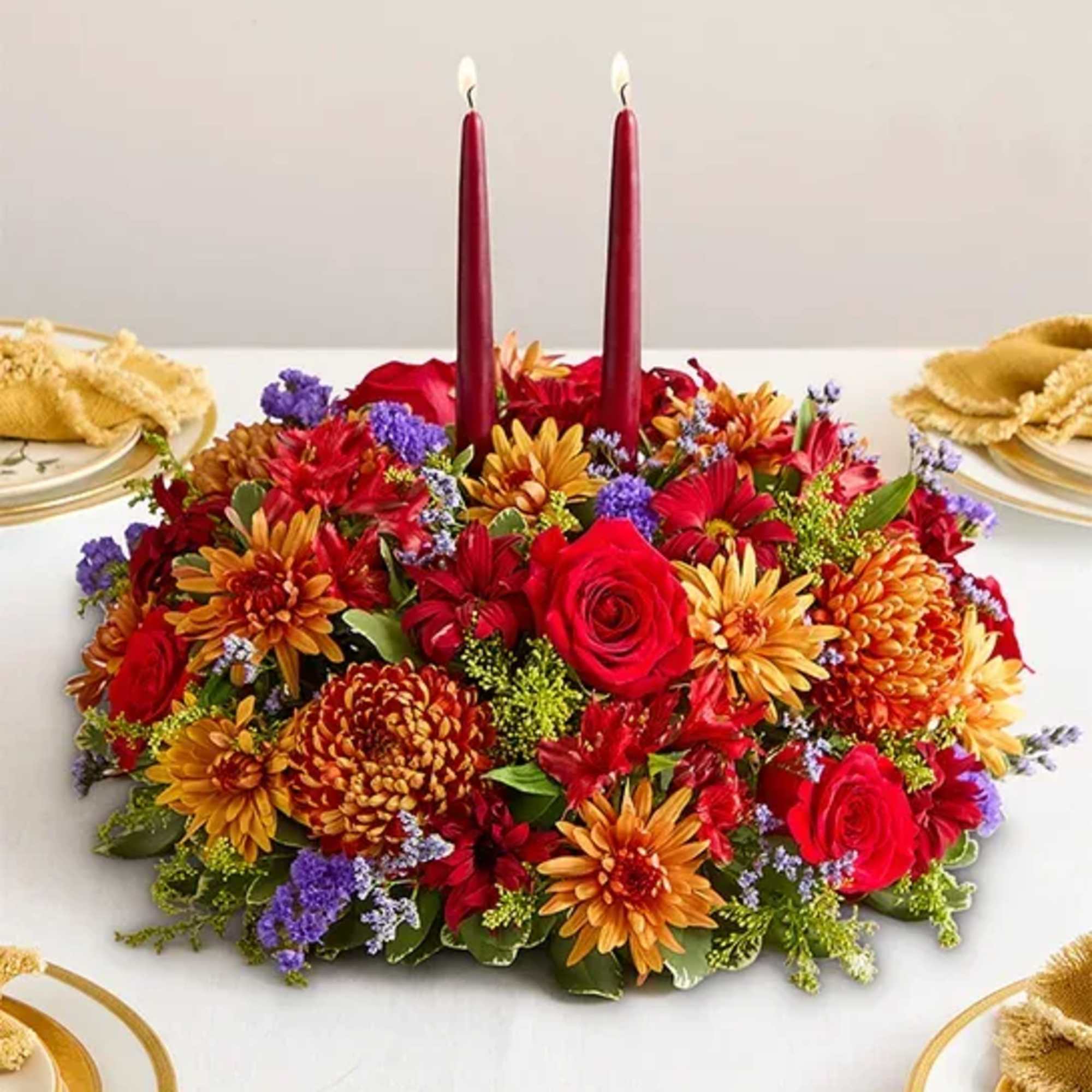 Our centerpiece captures the rich beauty of autumn, with bursts of red