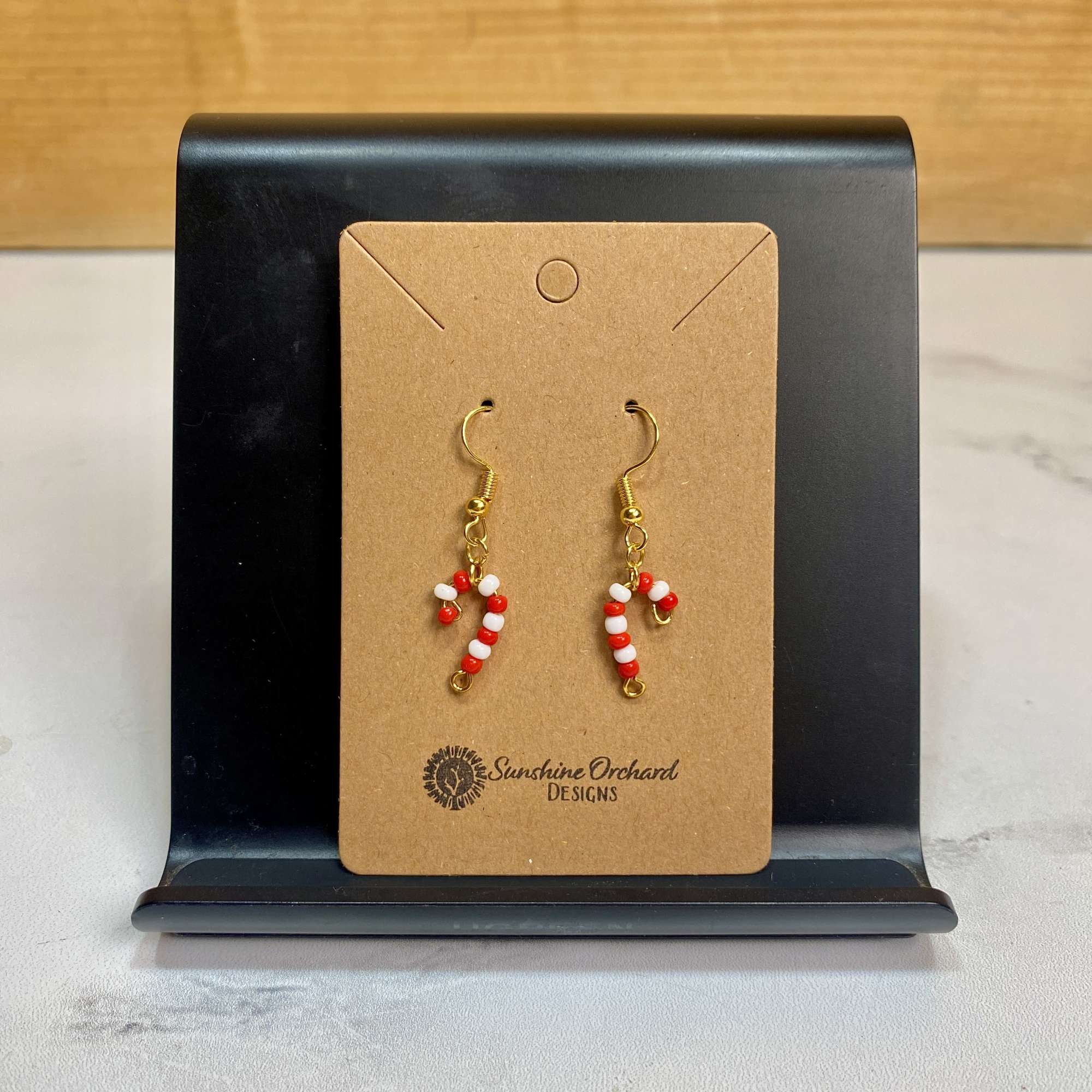 Our Beaded Candy Cane Earrings let you have a bit of holiday