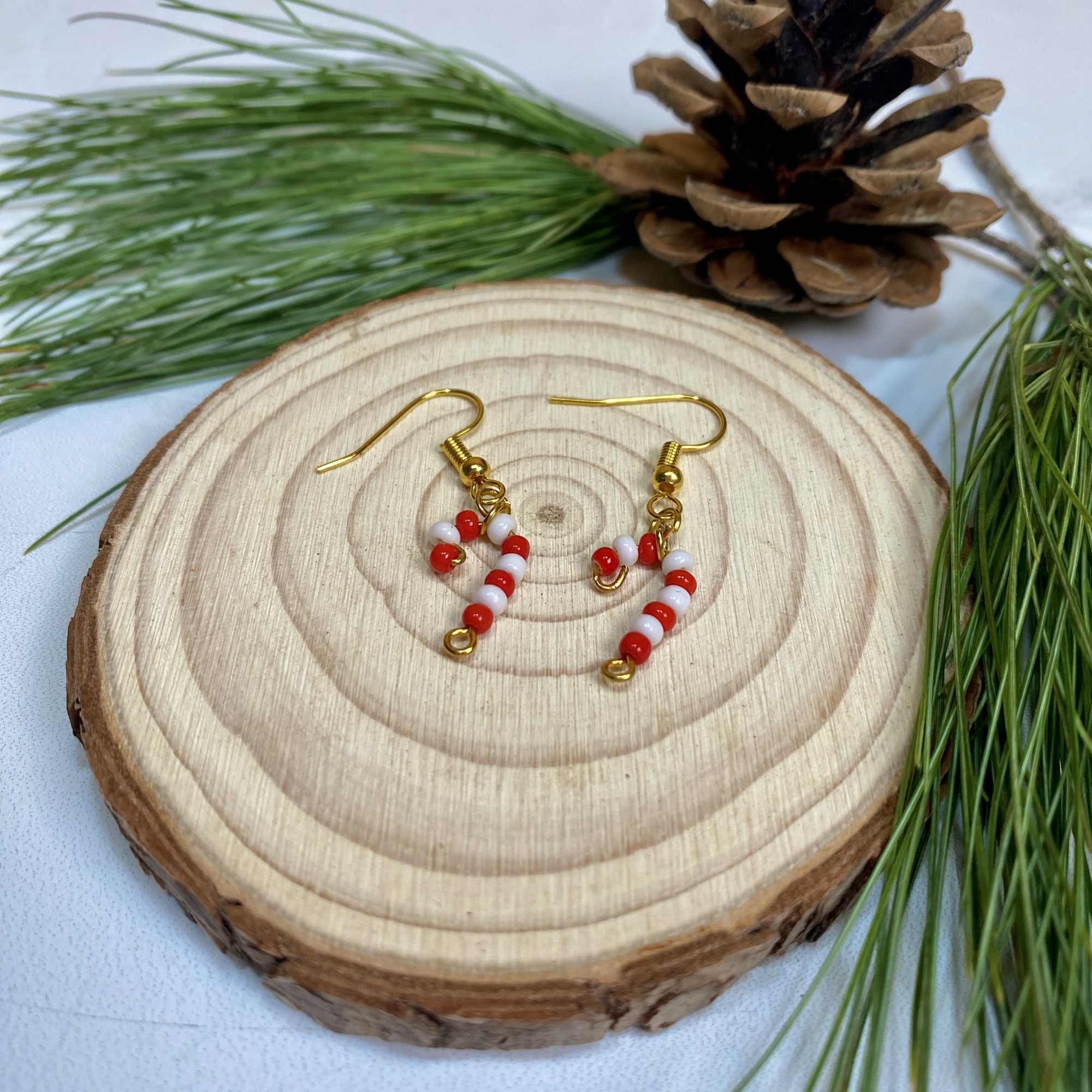 Our Beaded Candy Cane Earrings let you have a bit of holiday