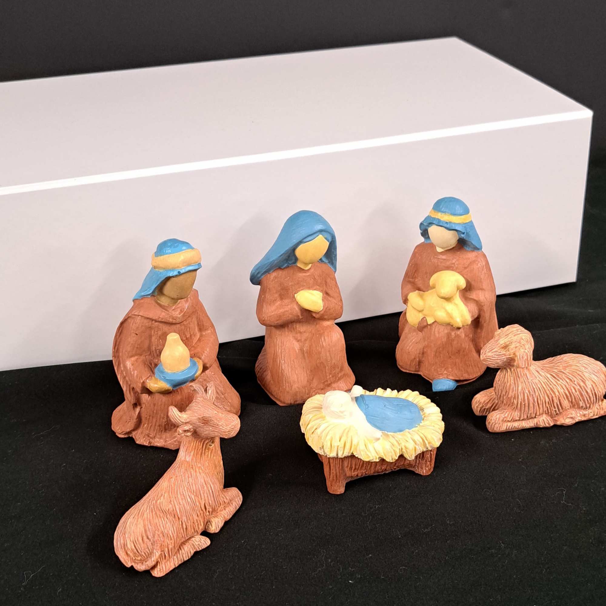 This beautifully hand-painted Nativity set features the Holy Family, Wise Men, shepherds