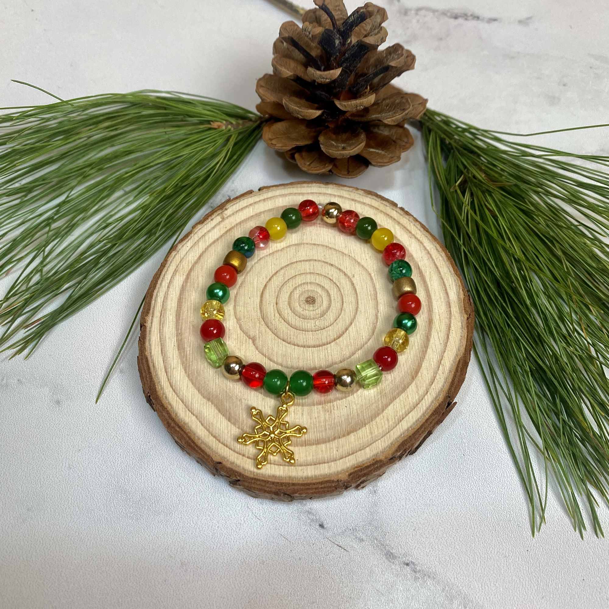 The Classic Cheer Gold Snowflake Bracelet is a great gift for this