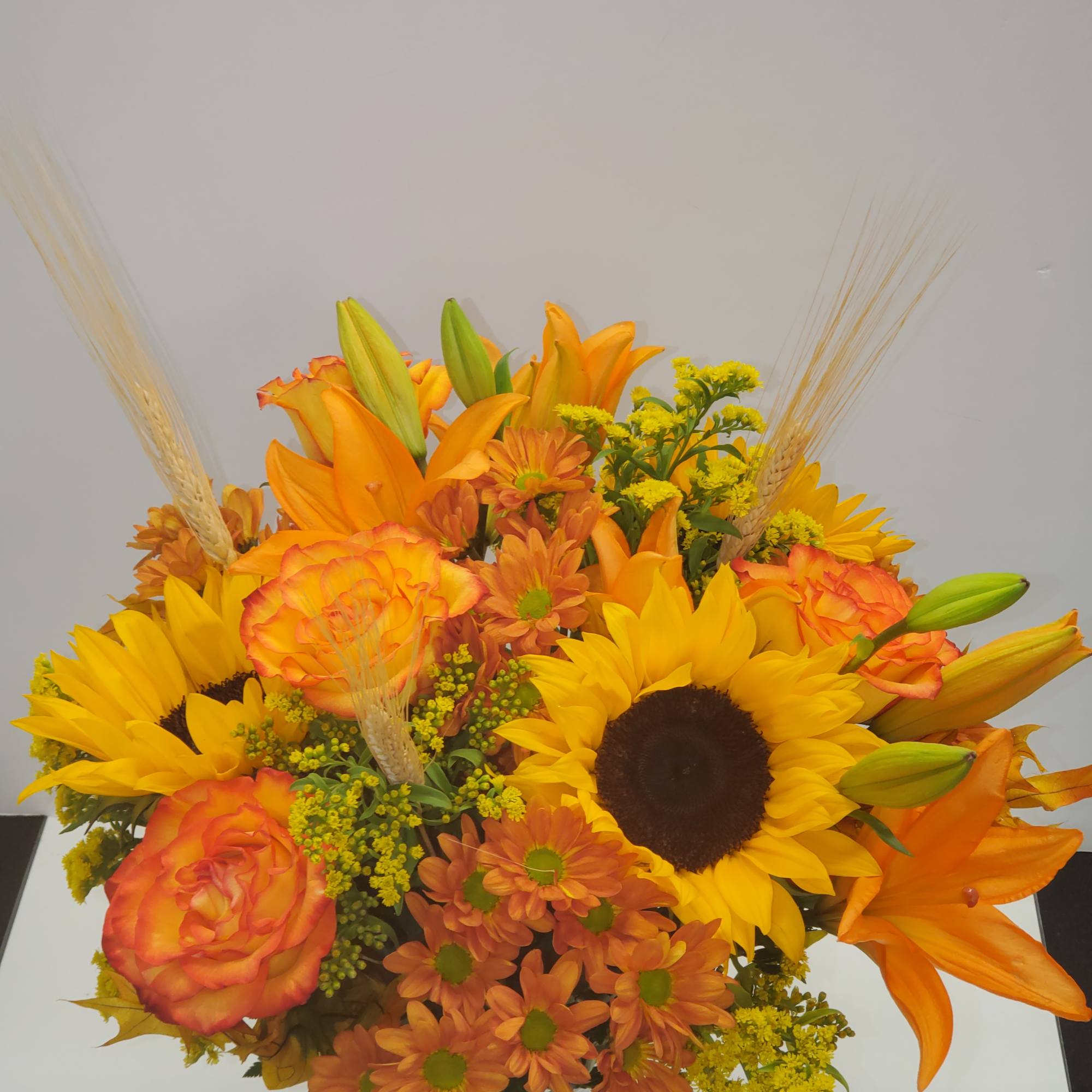 Traditional fall vase arrangement made with nice &amp; happy autumn colors