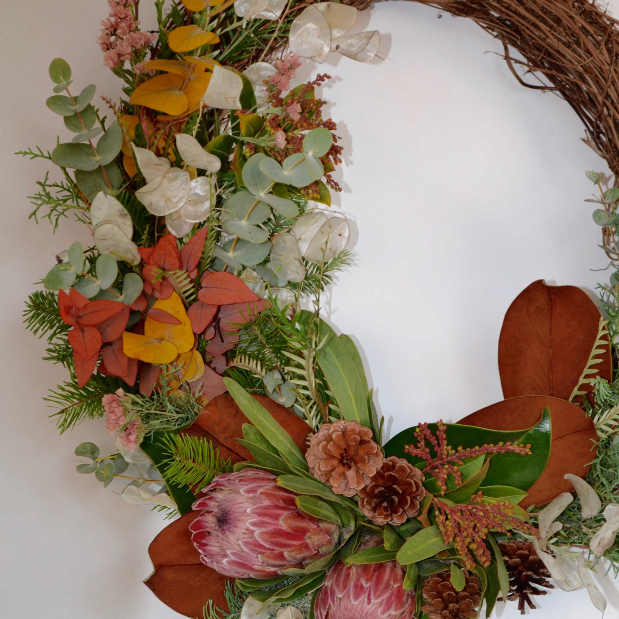 Tis the season for a mixed botanical dried floral wreath.