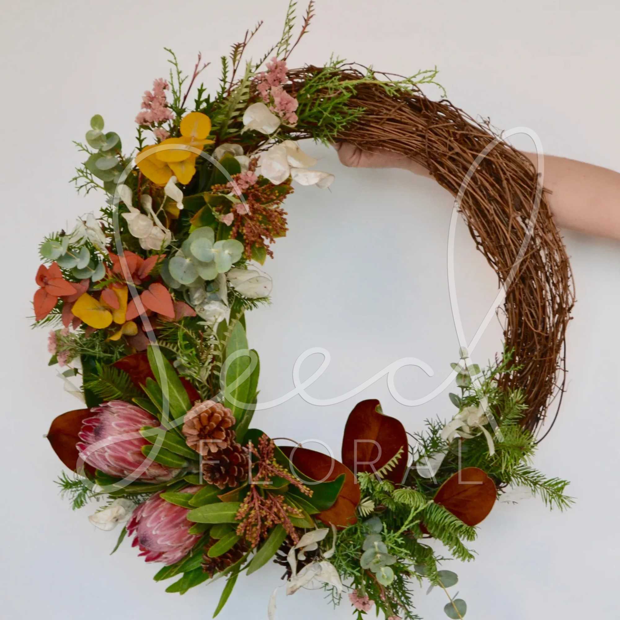 Tis the season for a mixed botanical dried floral wreath.