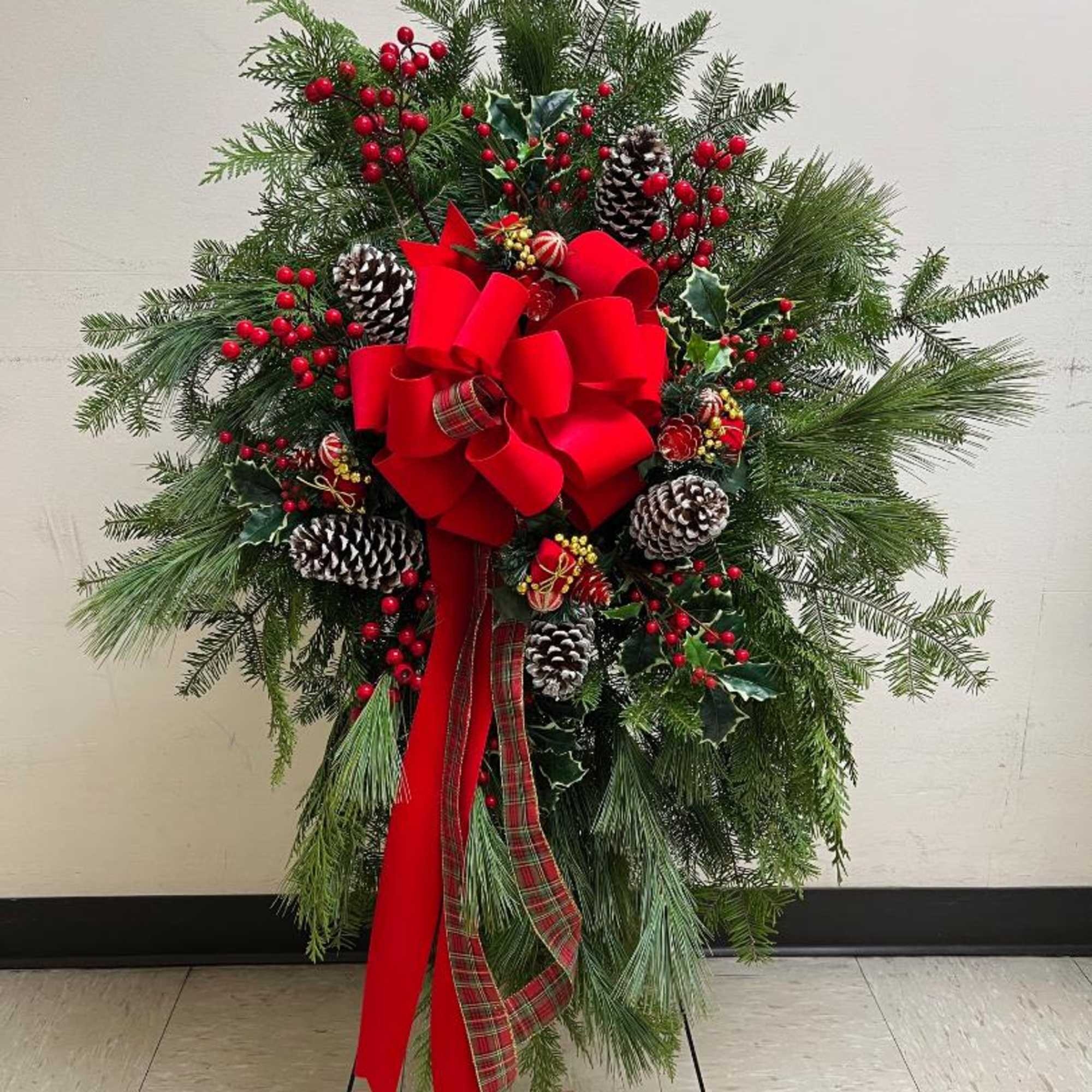 GRAVESIDE CHRISTMAS SWAG BY TWIN TOWERS FLORIST
3.3.2.