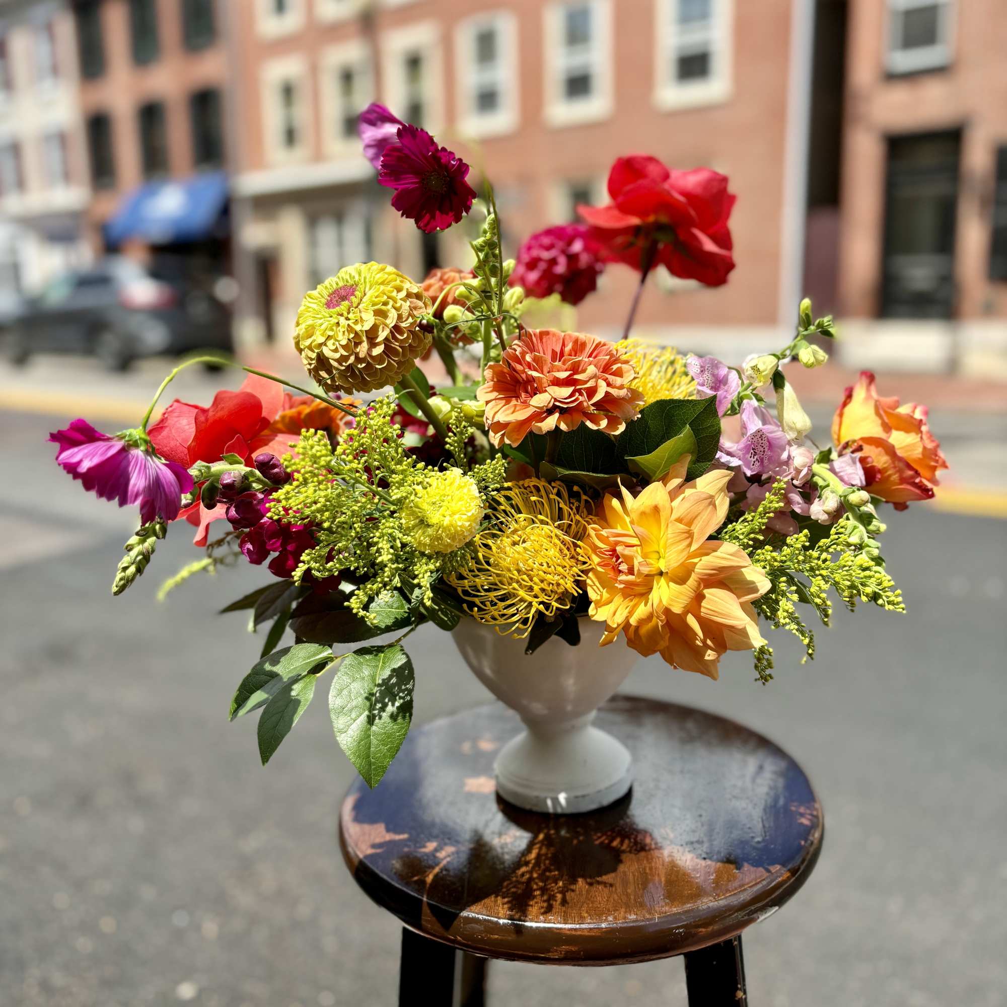 Crimson, golden ochre, and peachy to burnt orange hues reminiscent of a