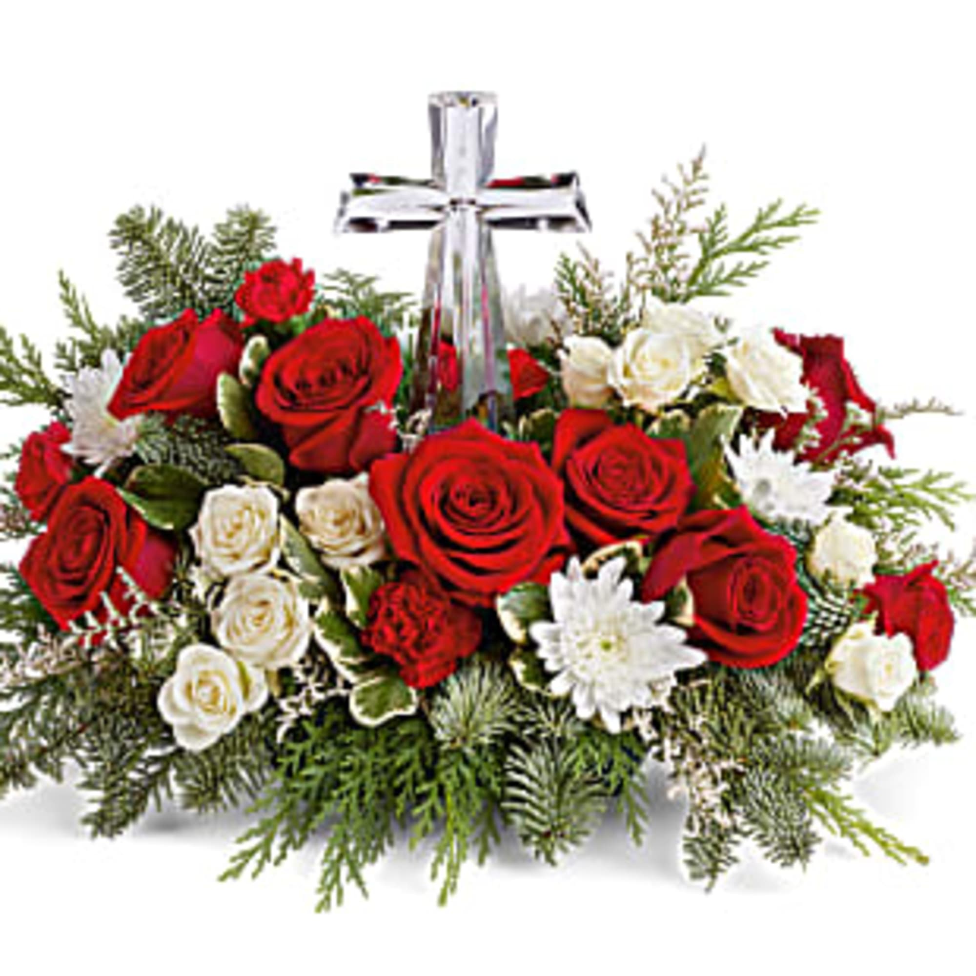 The crystal cross is nestled elegantly among red and white blooms, this