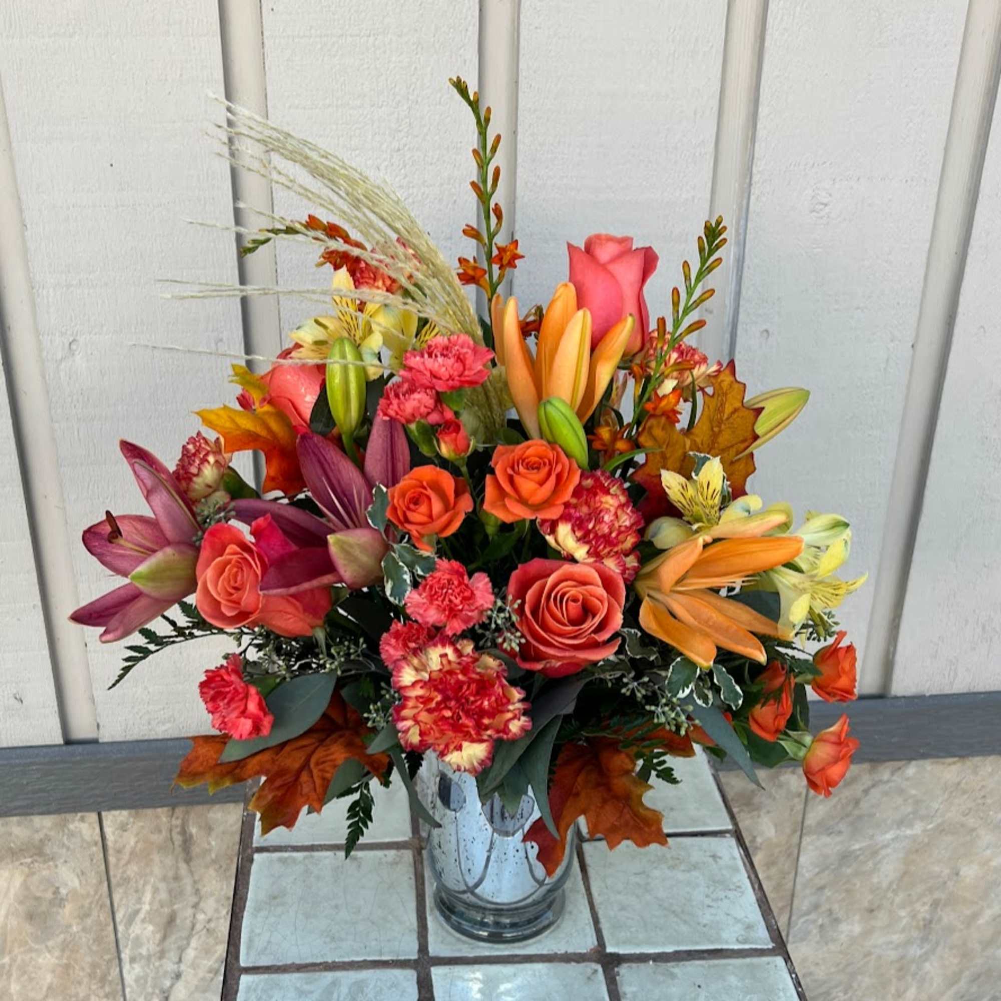 This fall, make that special someone blush with joy! Gorgeous bi-color roses