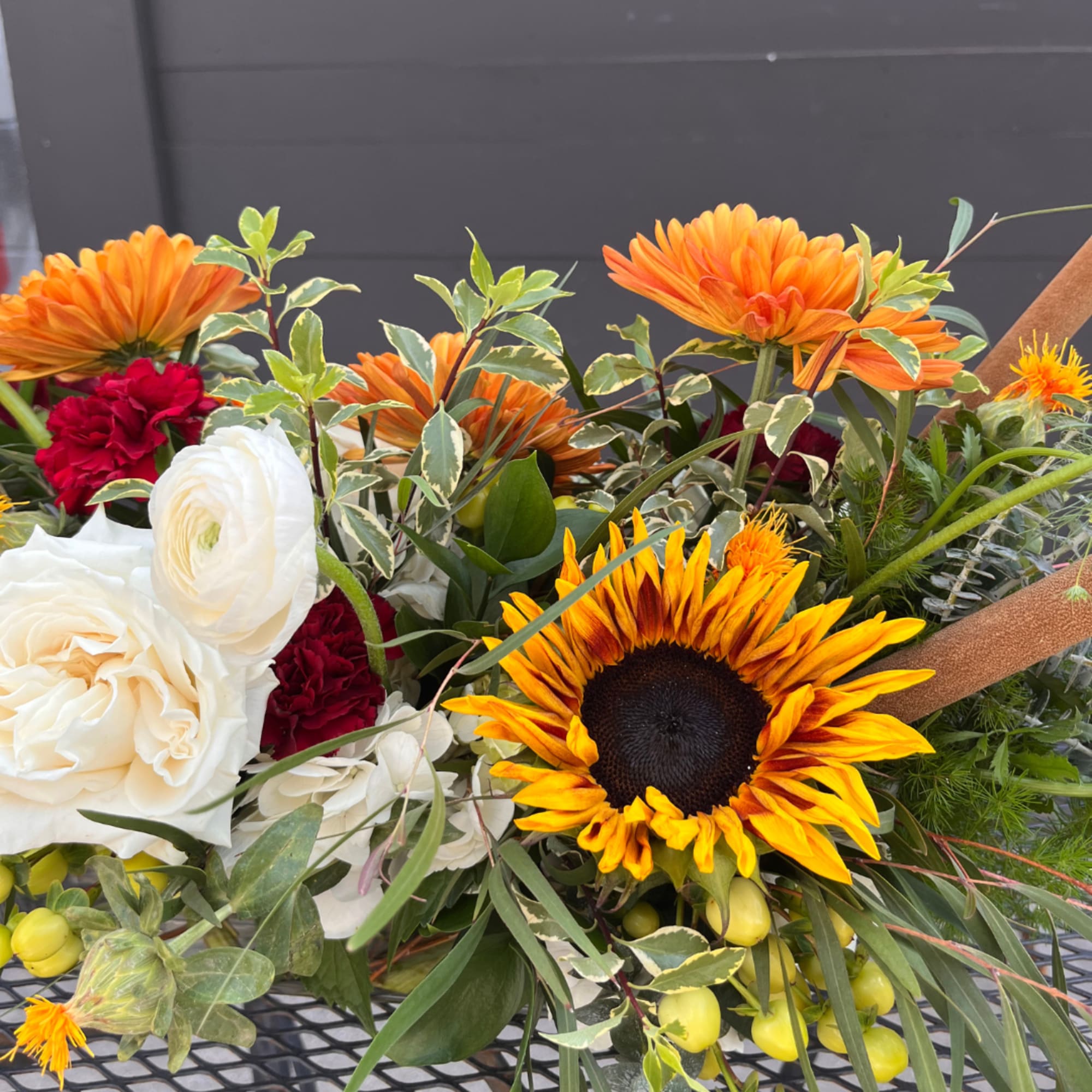 Our Thanksgiving Centerpiece is a thoughtfully curated, low-profile arrangement designed to elevate