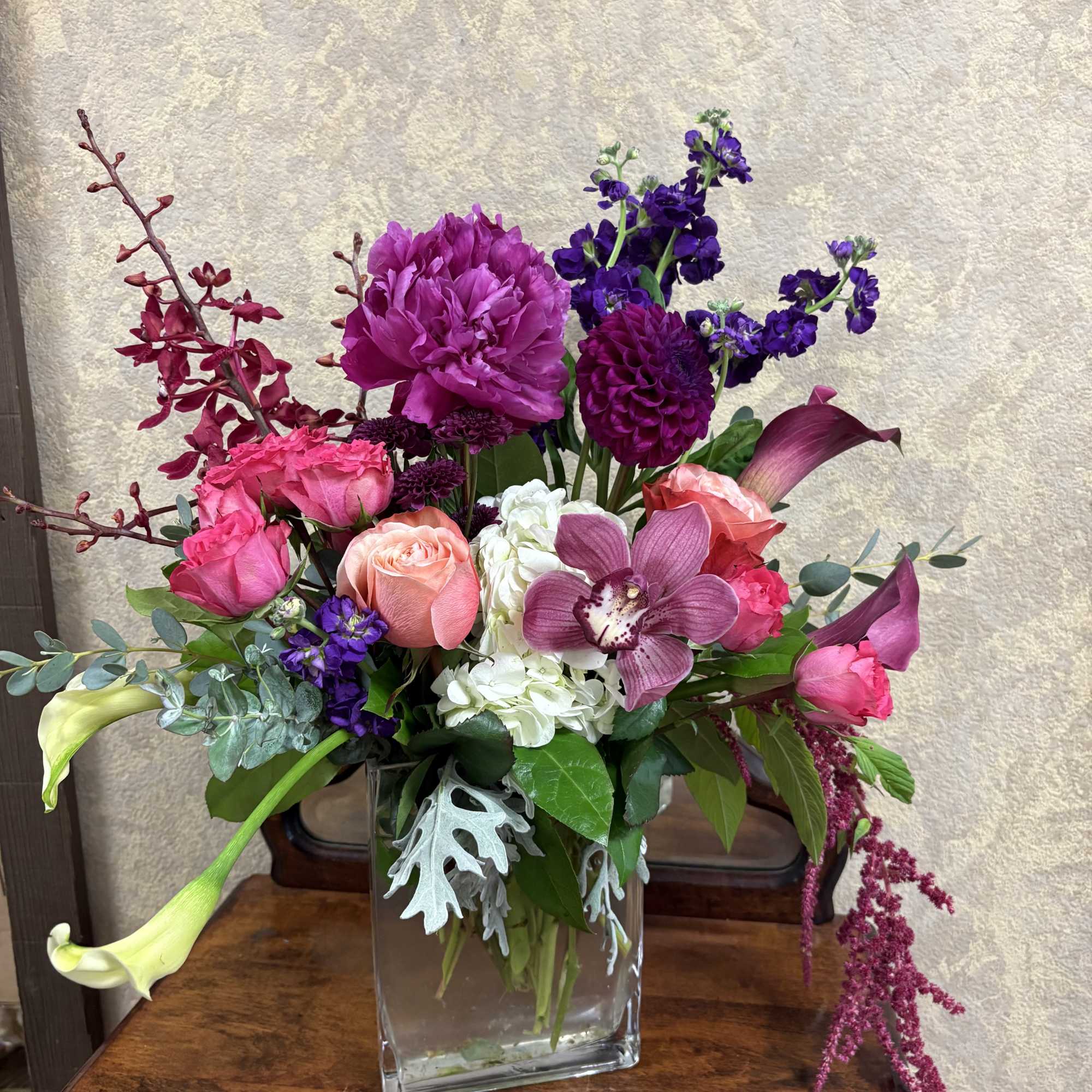 This lush and vivid arrangement contains all premium flowers that will blow