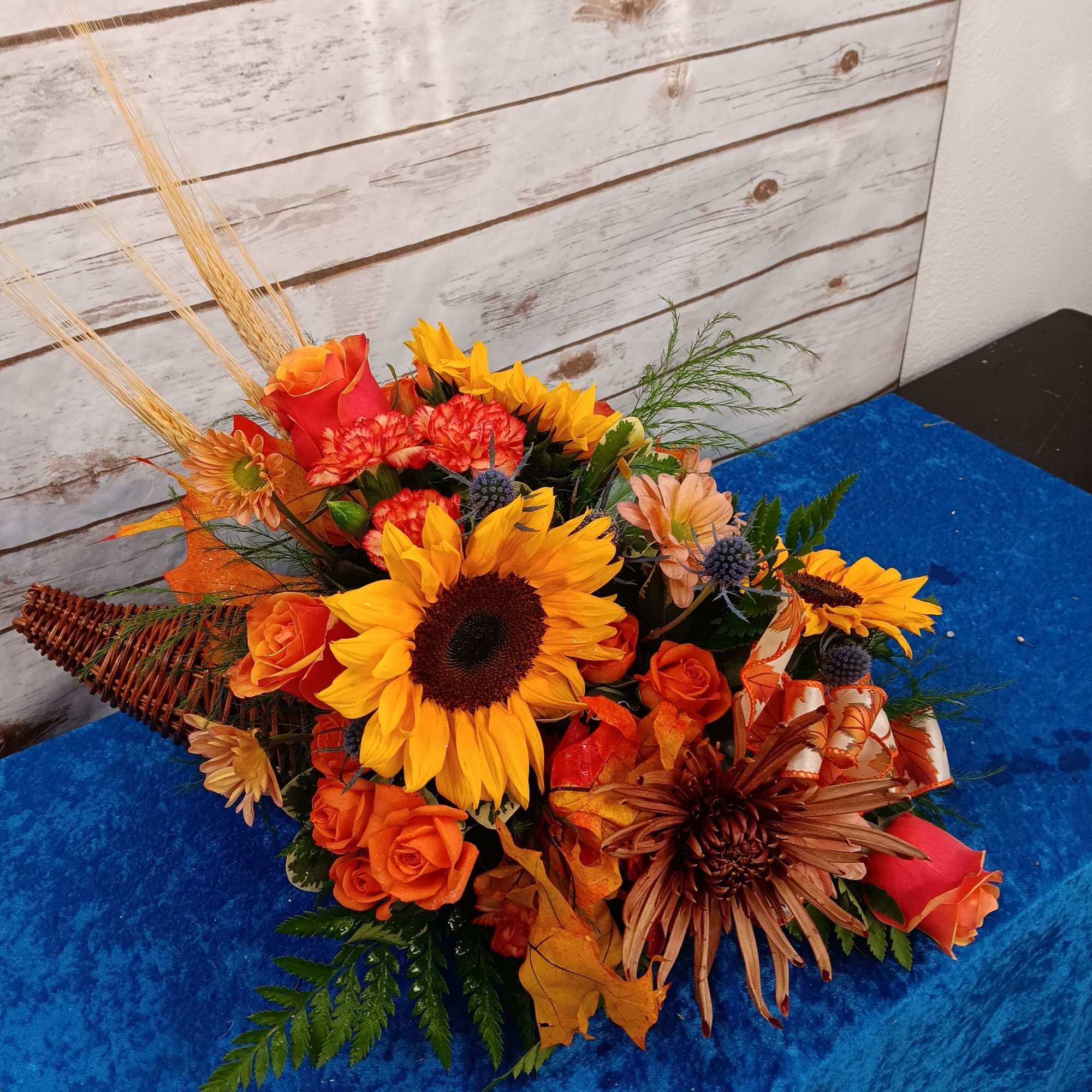 Send a symbol of tradition and family. 

In classical antiquity, the cornucopia