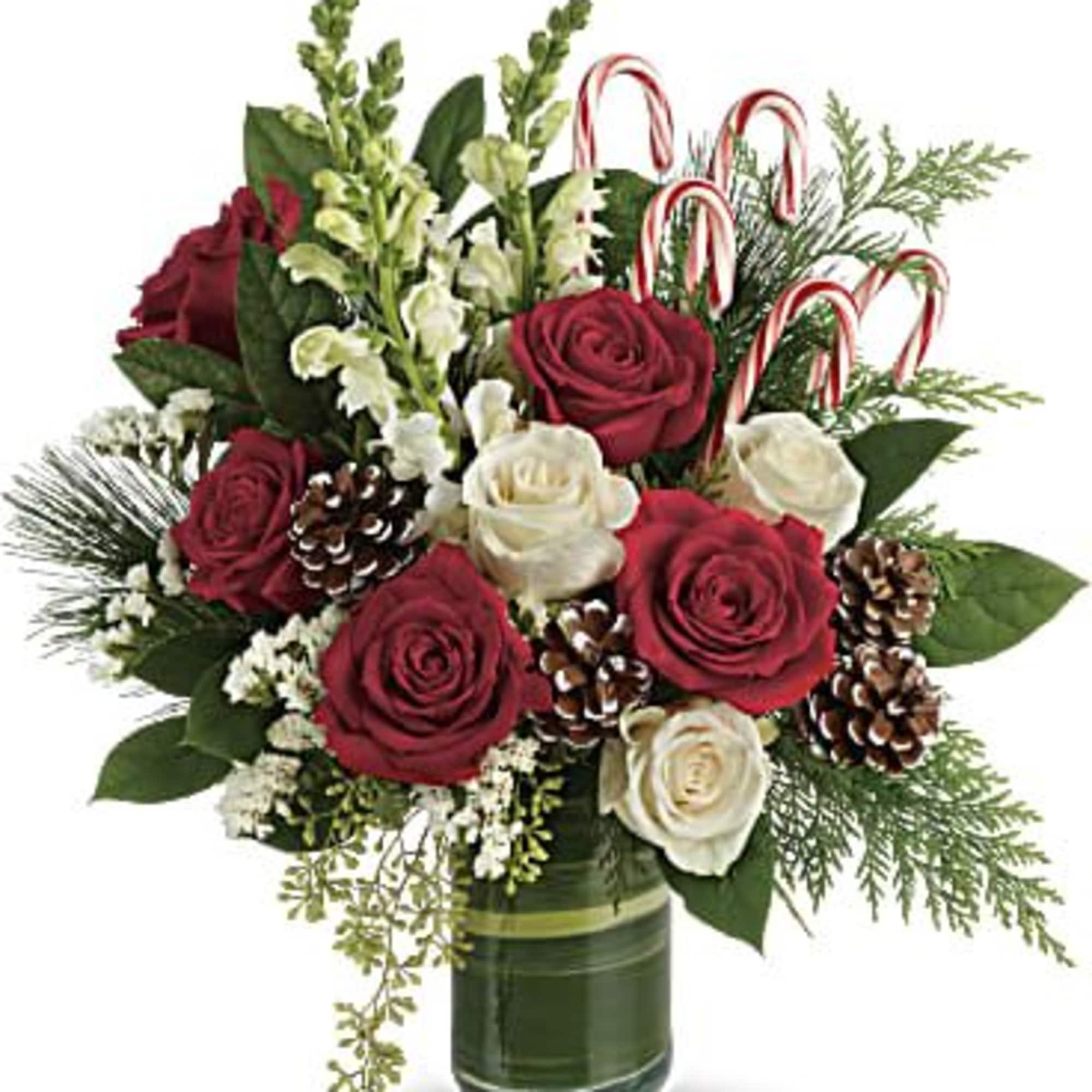 An instant Christmas party, this festive bouquet bursts with fresh blooms of