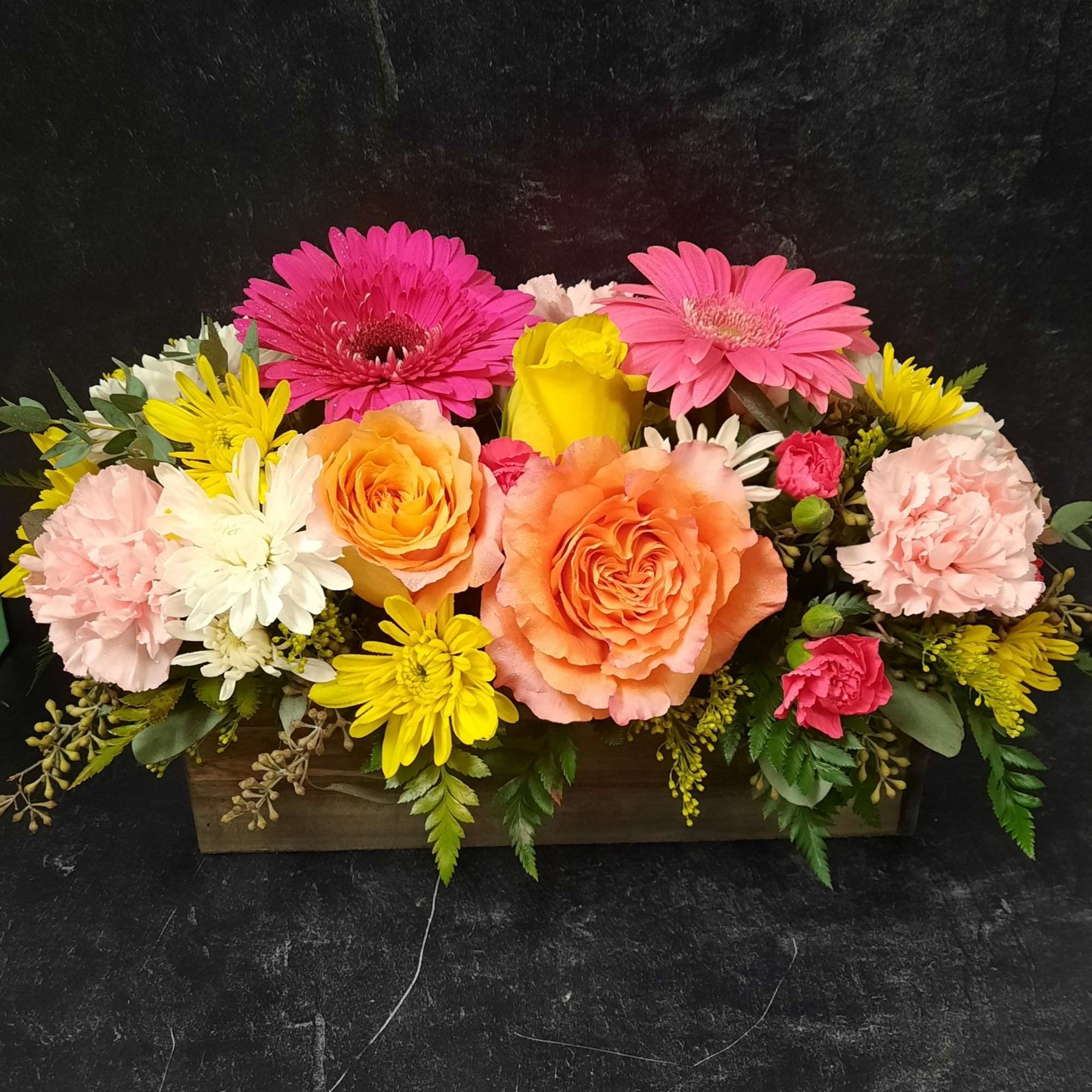 Keep things fun with this jewel toned flower box! Our most seasonal
