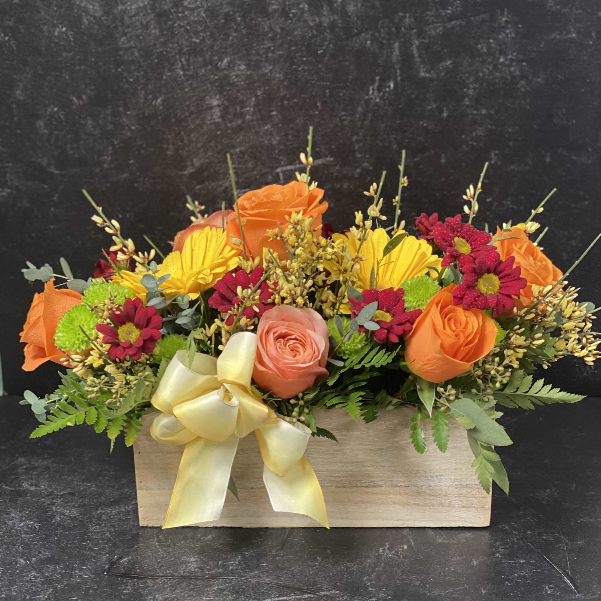 Keep things fun with this jewel toned flower box! Our most seasonal