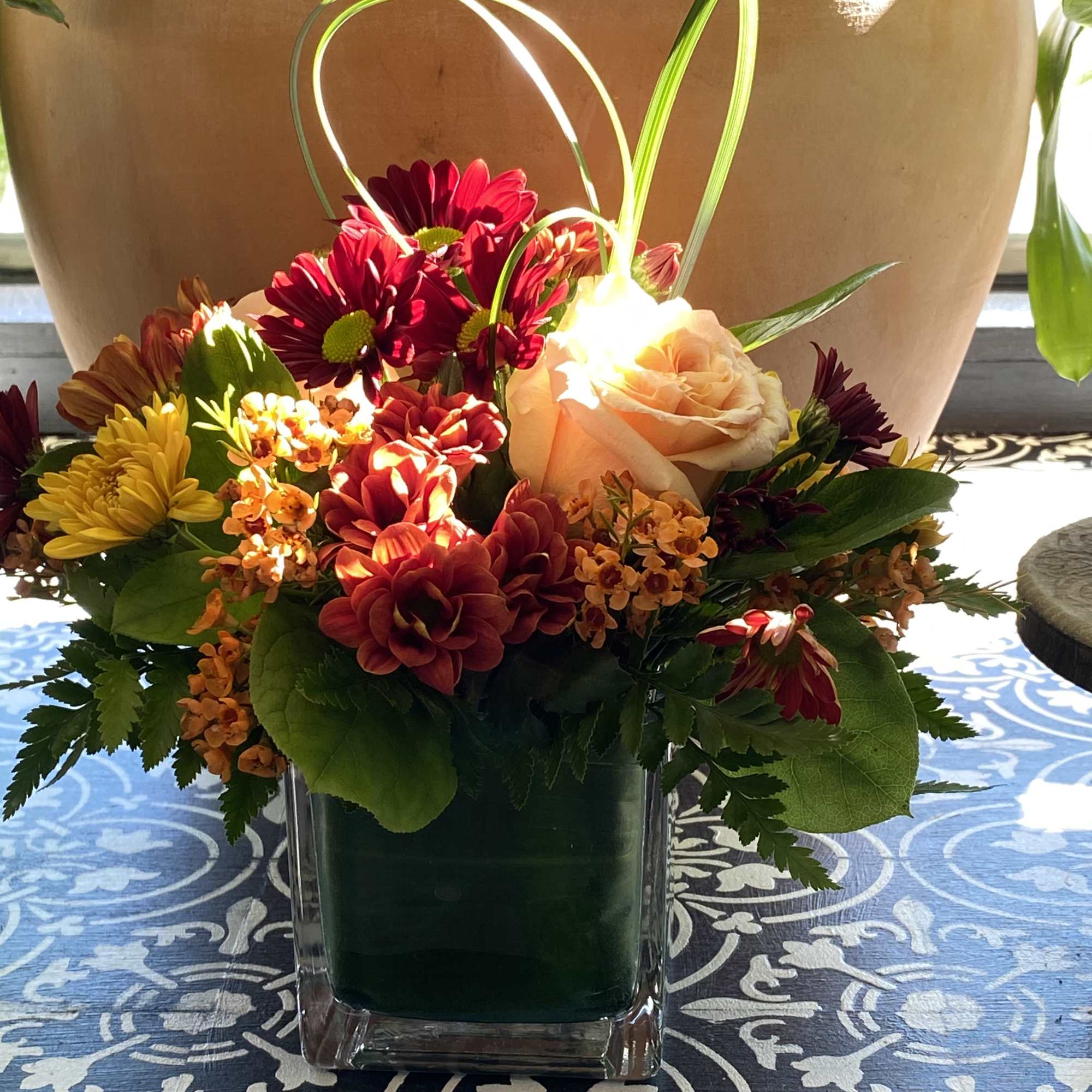 Delight someone special, including yourself, today! Featuring in season roses, Gerbera daisy