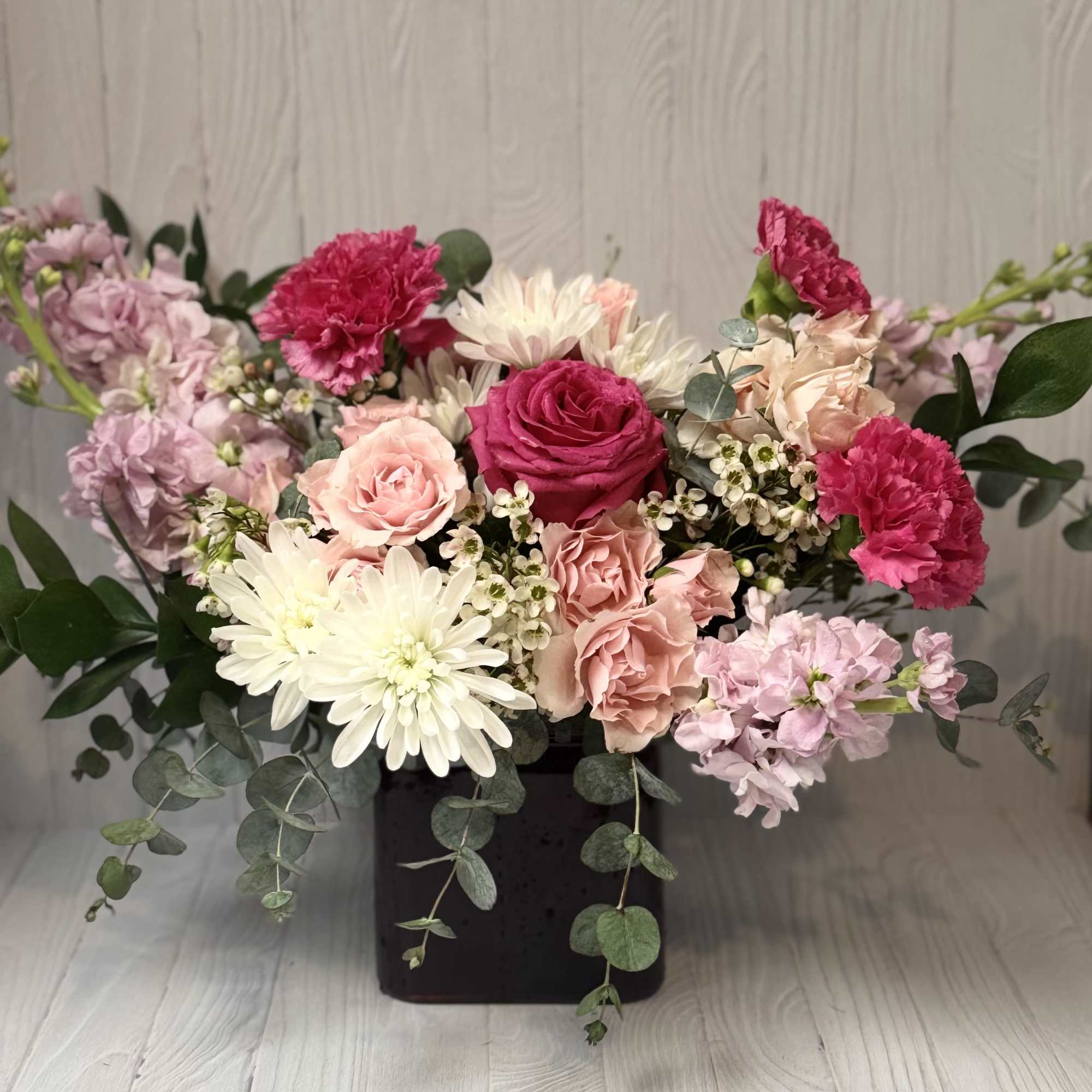 Beautiful flowers to cheer up your loved one in a square, modern