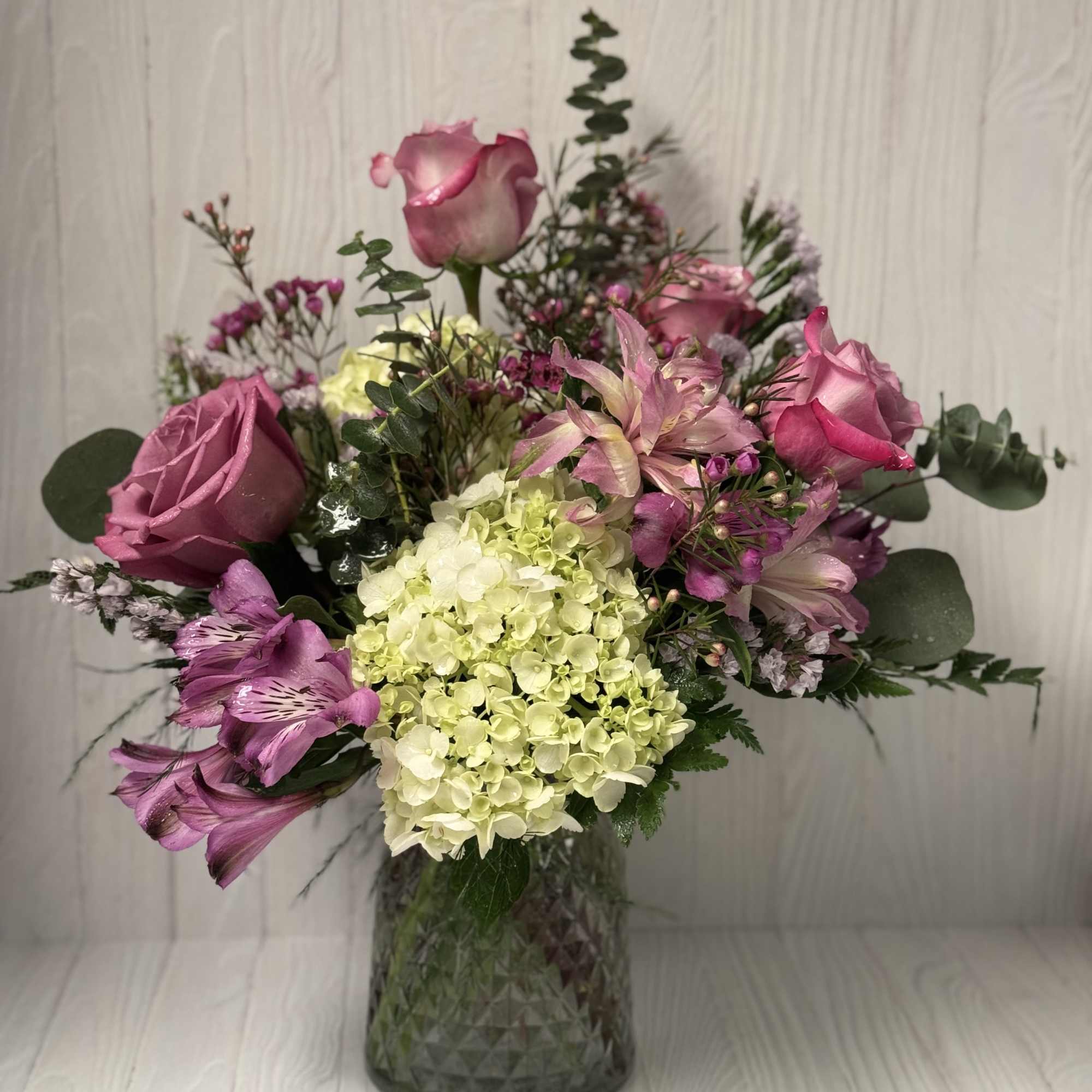 A beautiful collection of Hydrangea, Roses, Stock, Alstro, Premium Greenery and Filler