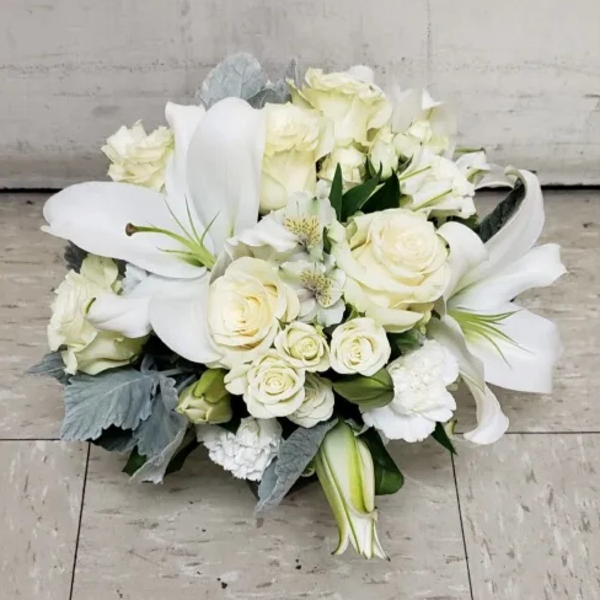 WHITE CENTERPIECE IN CLEAR GLASS CUBE VASE BY TWIN TOWERS FLORIST IN