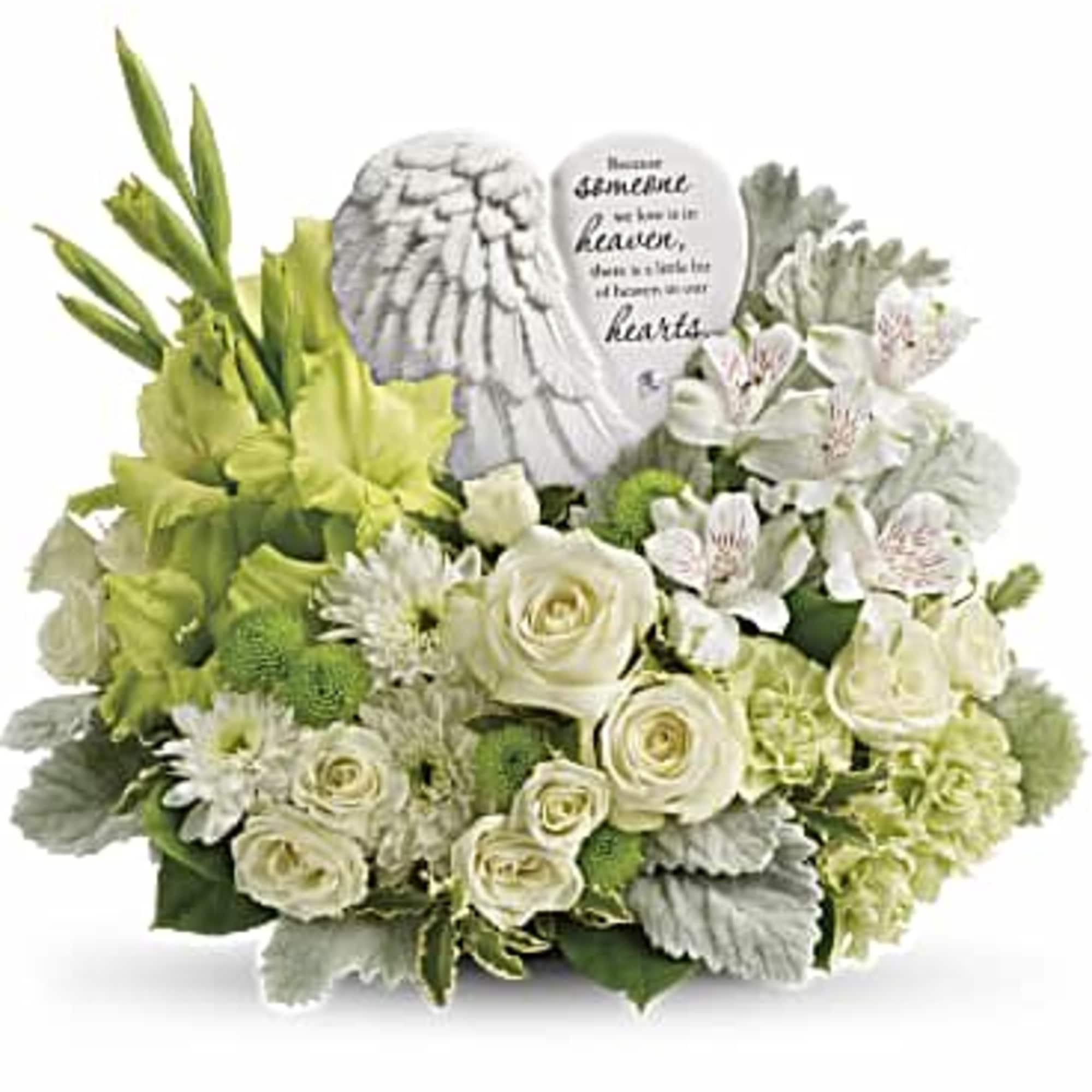 A heartfelt expression of your sympathy, this majestic mix of white roses
