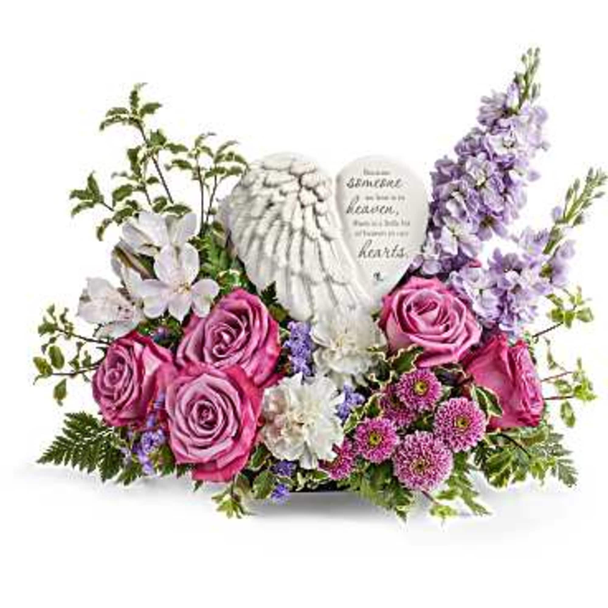 A heartfelt tribute to a cherished life, Teleflora&#039;s Remembering Love Bouquet surrounds