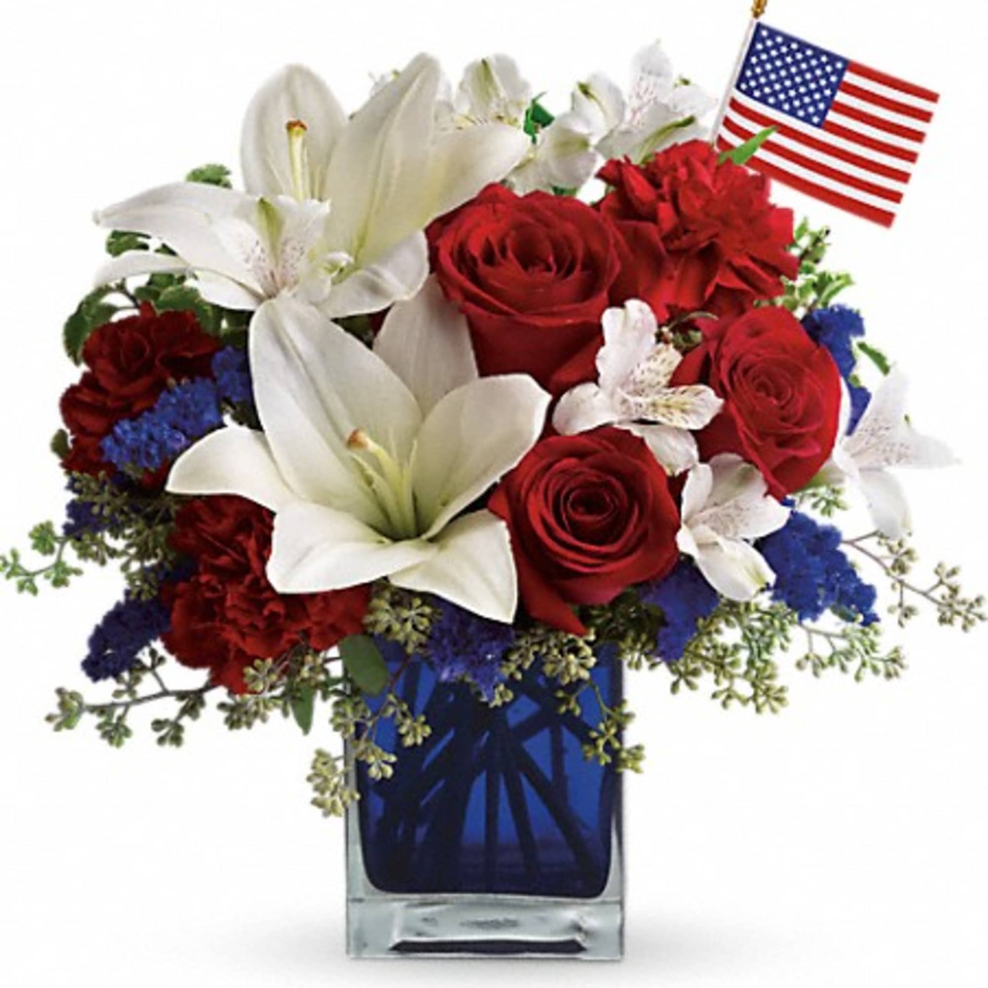 Bold and beautiful, this patriotic bouquet features stunning white lilies, lush red