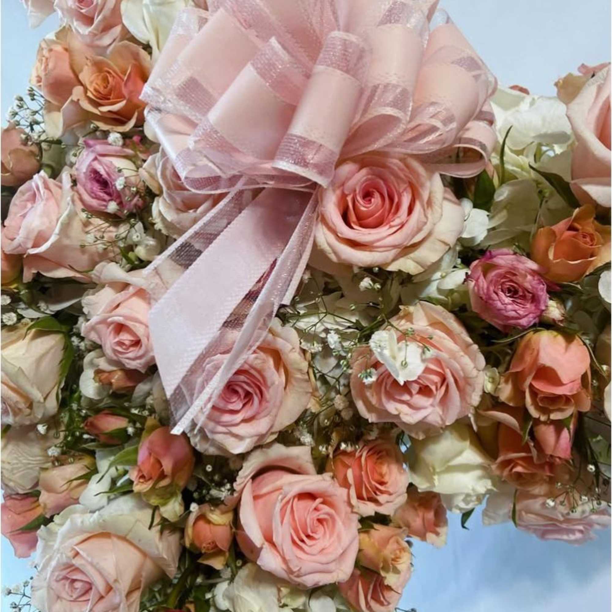 A timeless symbol of faith, love, and remembrance, this exquisite standing cross