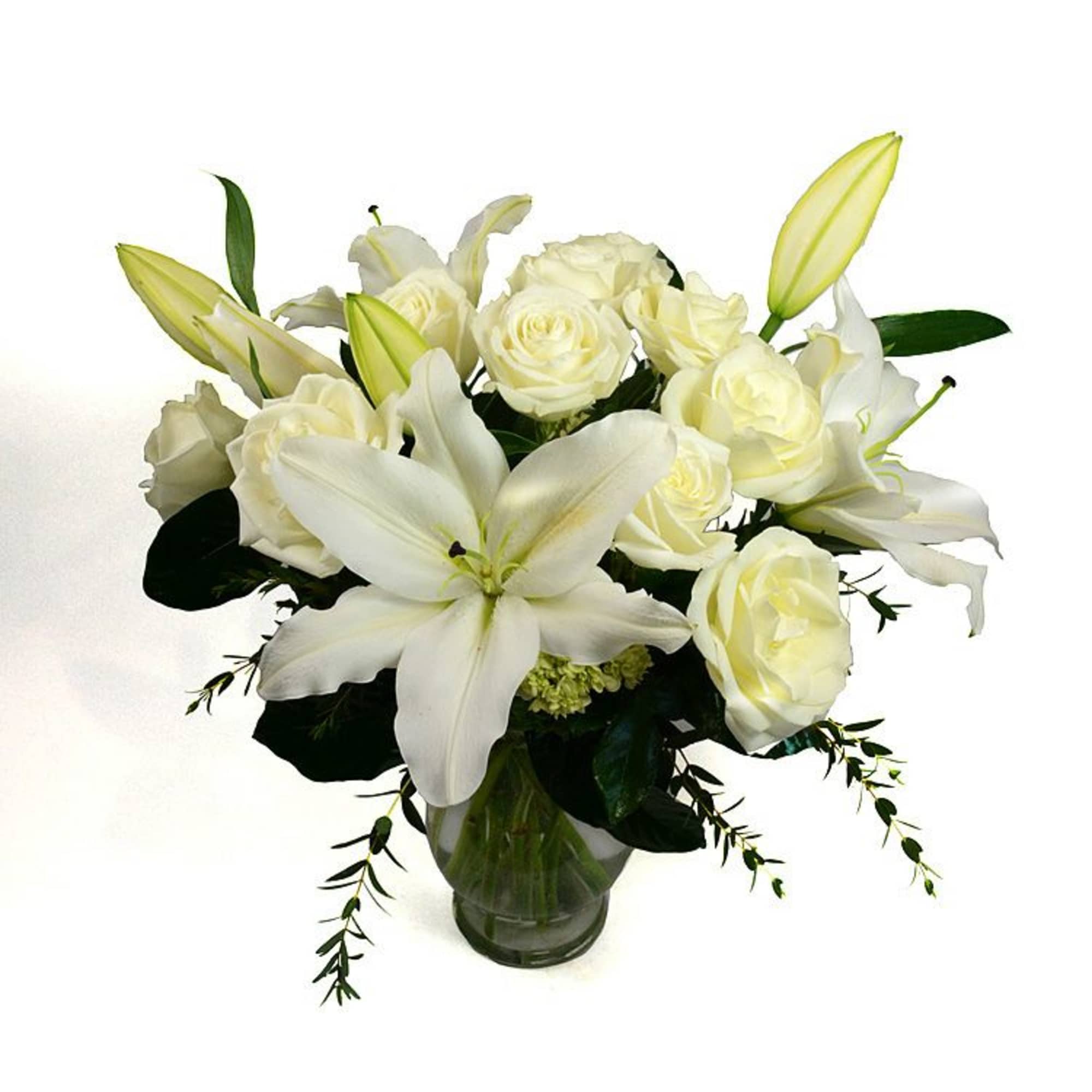 Classic white and green flowers and foliage presented in our clear glass