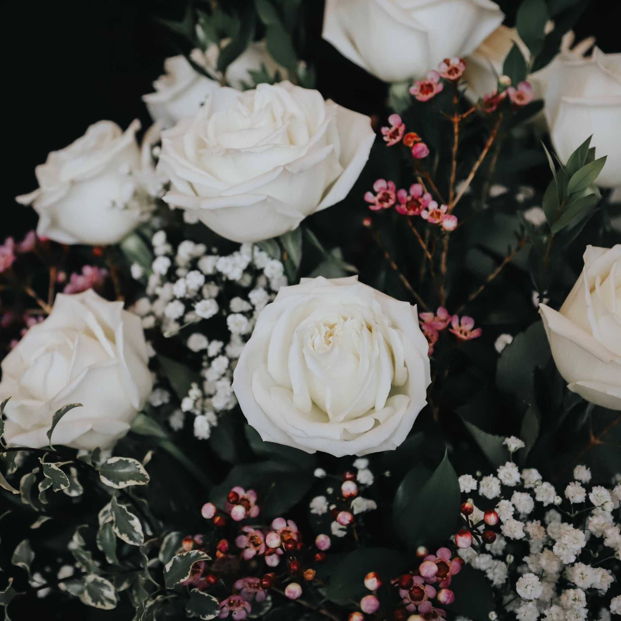 Romance blossoms beautifully within this elegant bouquet. The serenity and innocence of