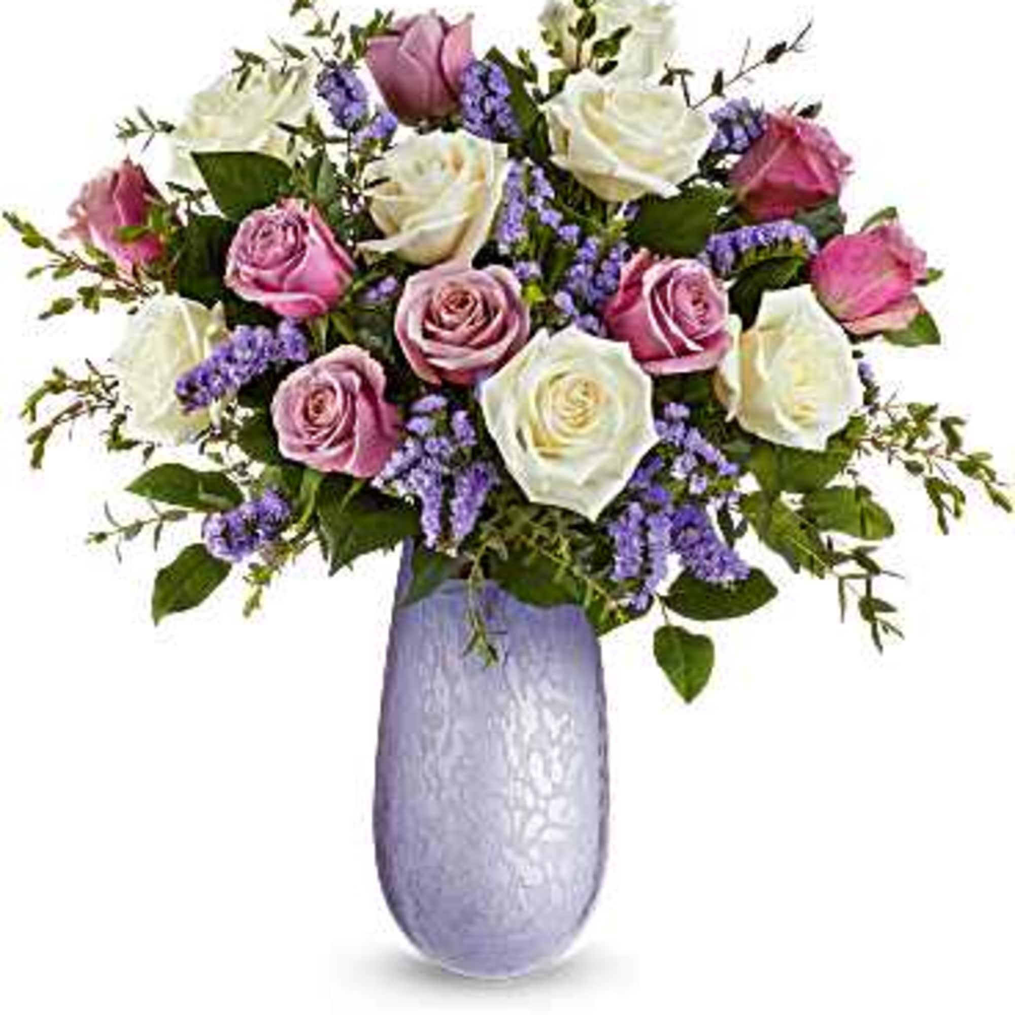 Ecuadorian White and Lavender roses bring the splendor to this beautiful design