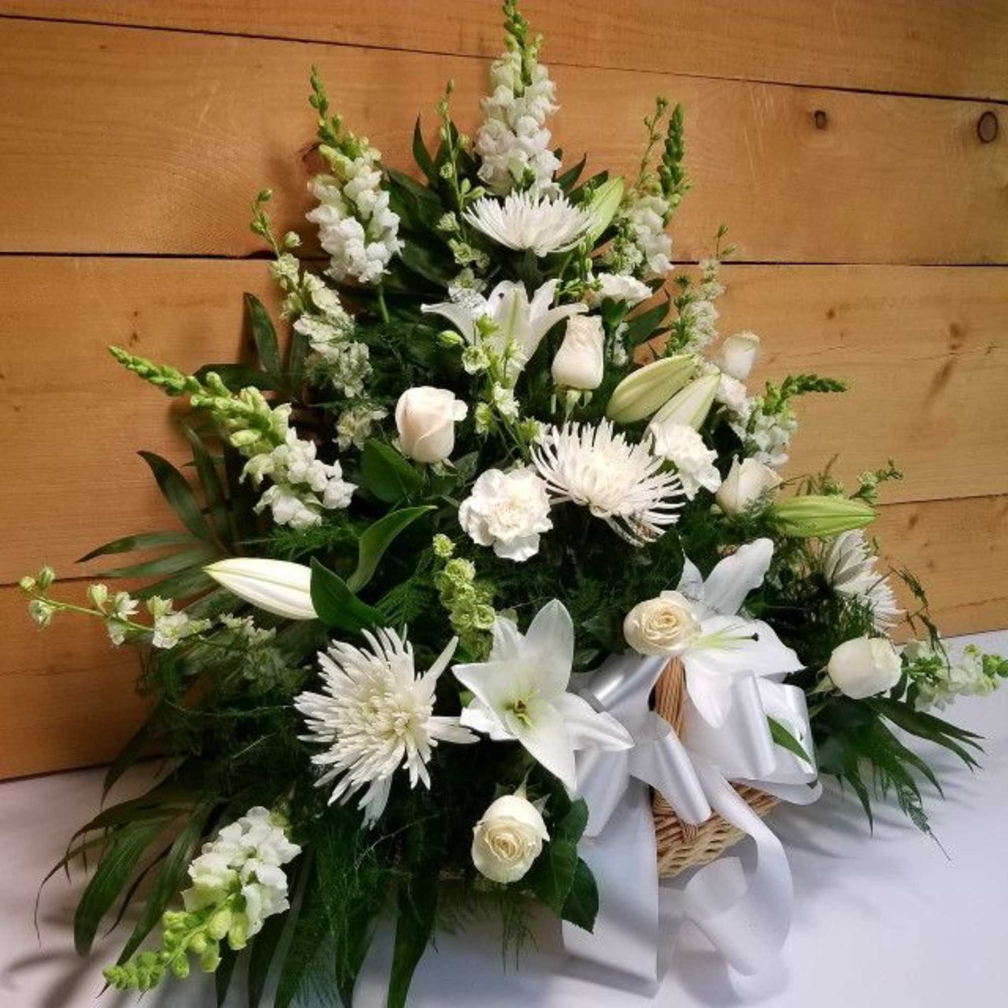 Send a message of sympathy, love and hope with this fireside basket