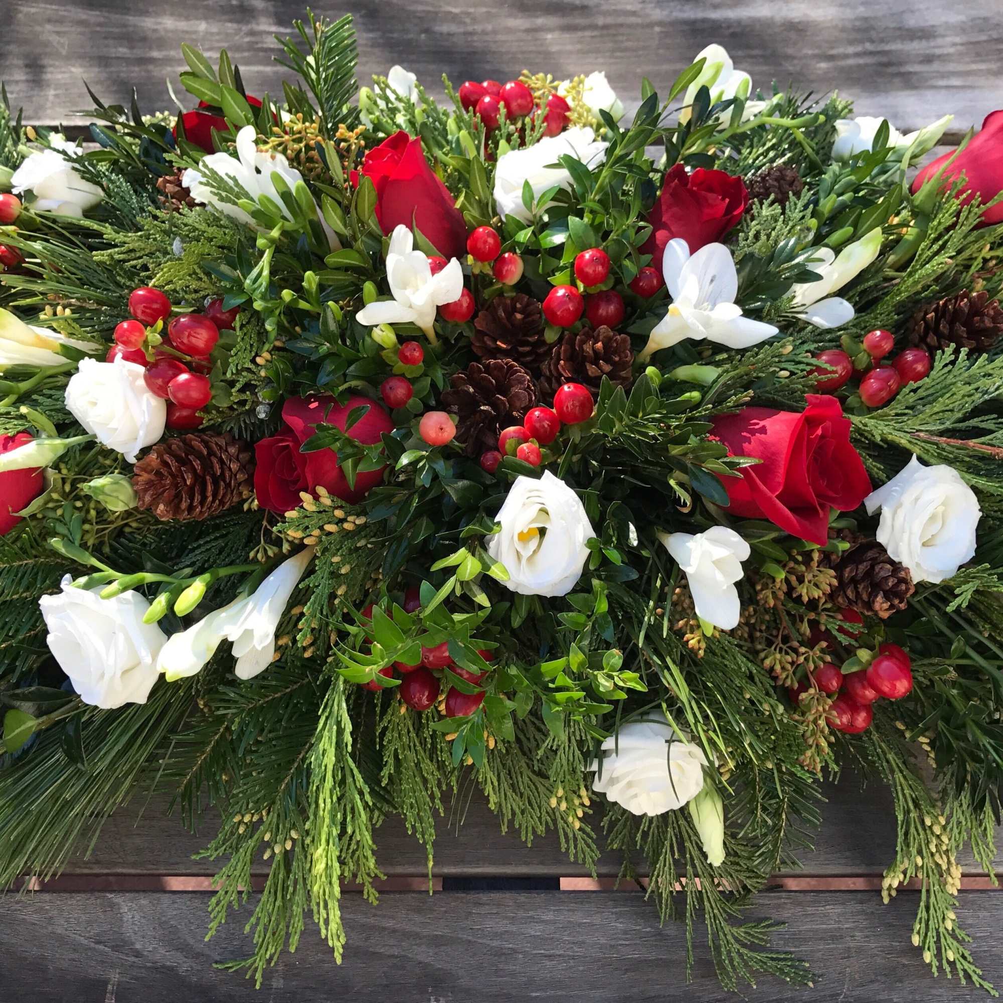 Send this elegant and classic centerpiece to that someone special during the