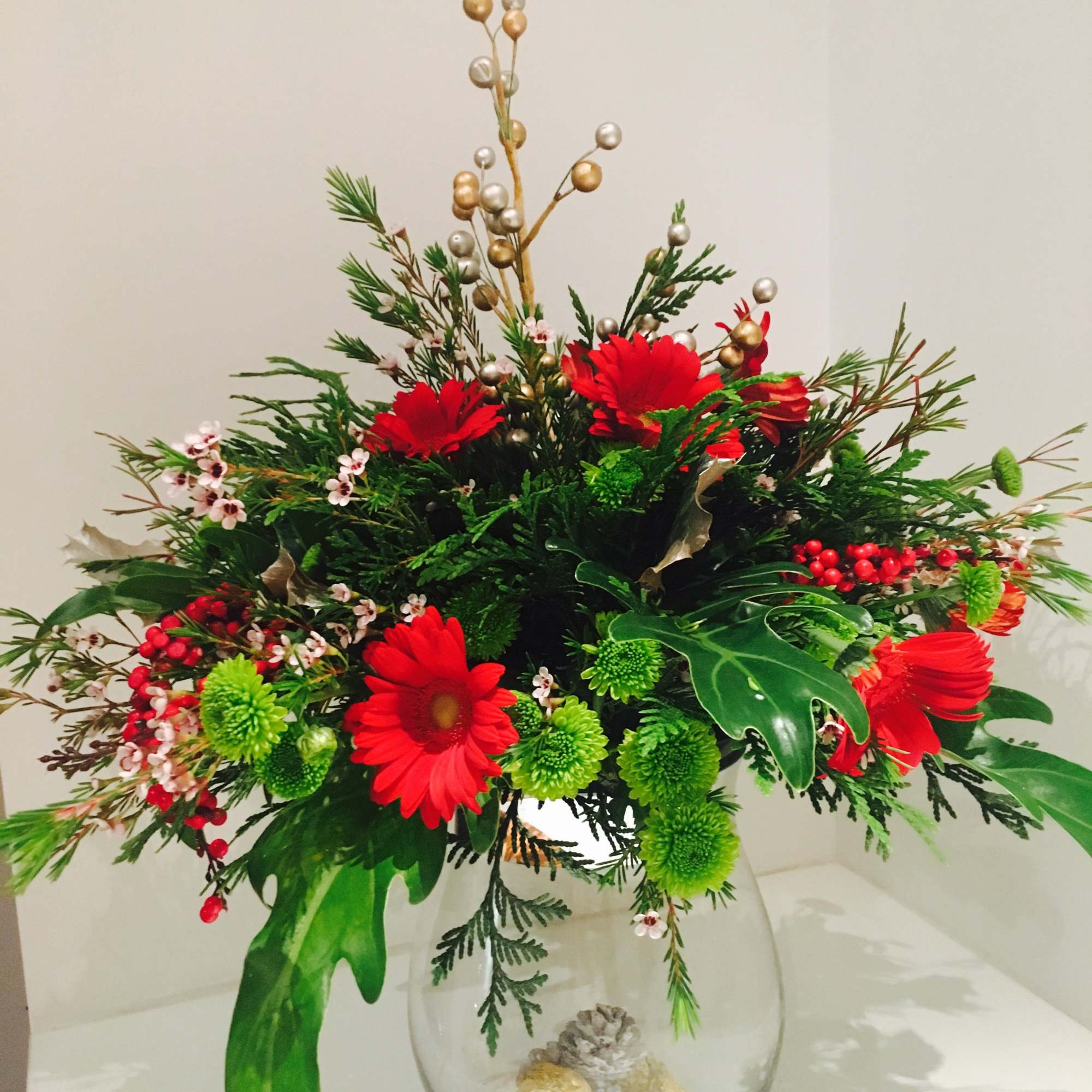 This multi seasonal bouquet is festive and perfect for any celebratory occasion.