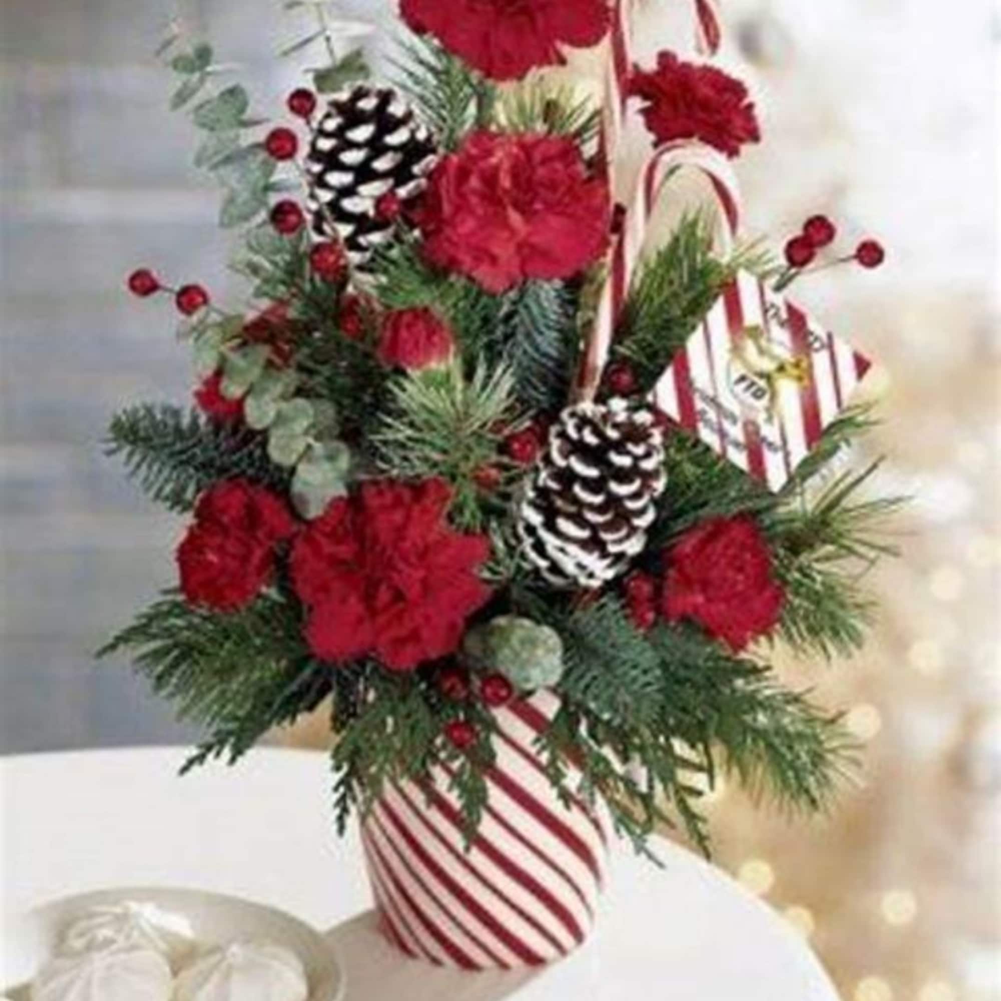 This multi seasonal bouquet is festive and perfect for any celebratory occasion.