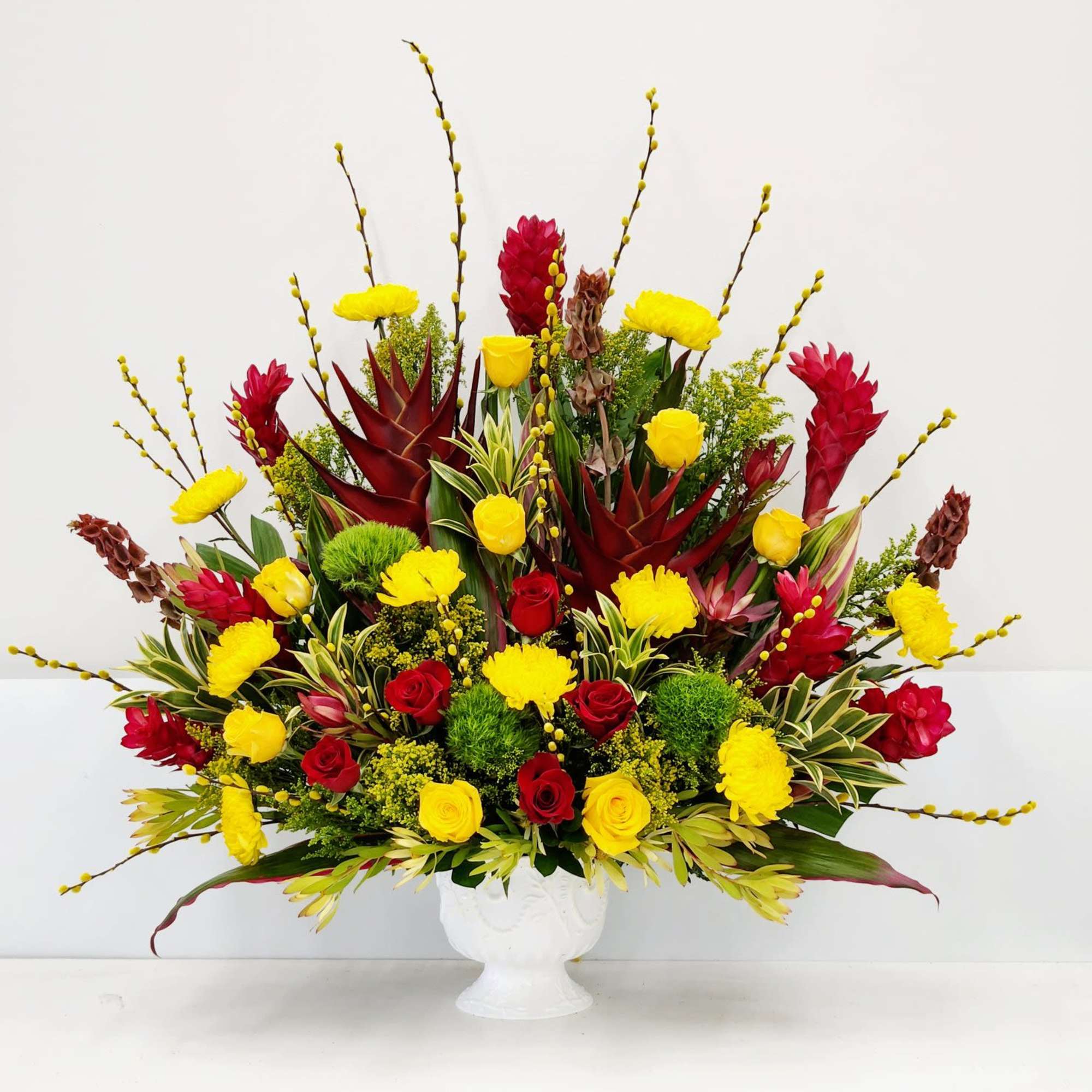 Celebrate their special day with vibrant tropical blooms that radiate warmth and