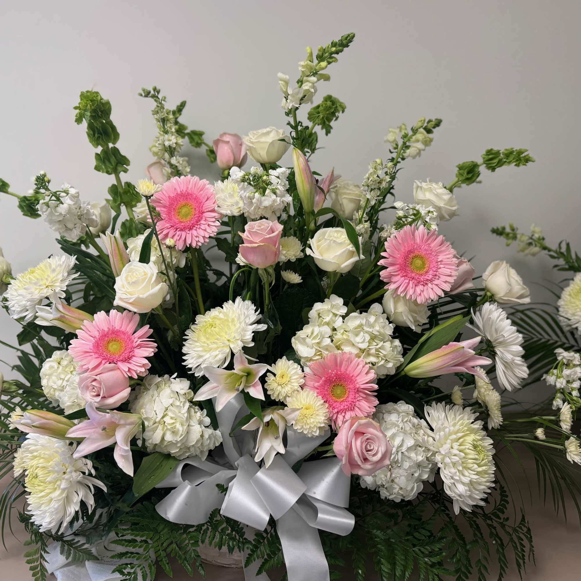 Pastel basket suitable for funeral services 
