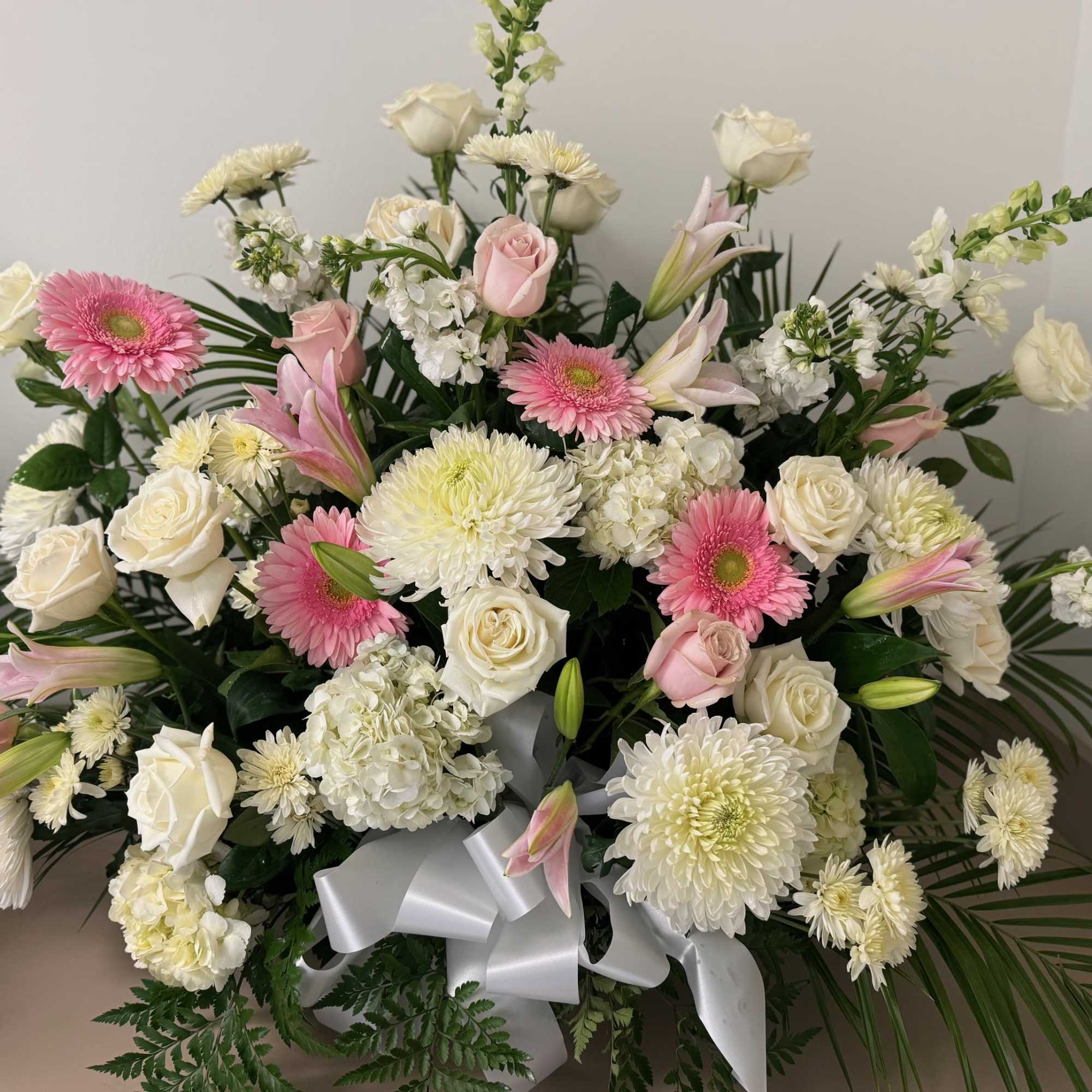 Pastel basket suitable for funeral services 
